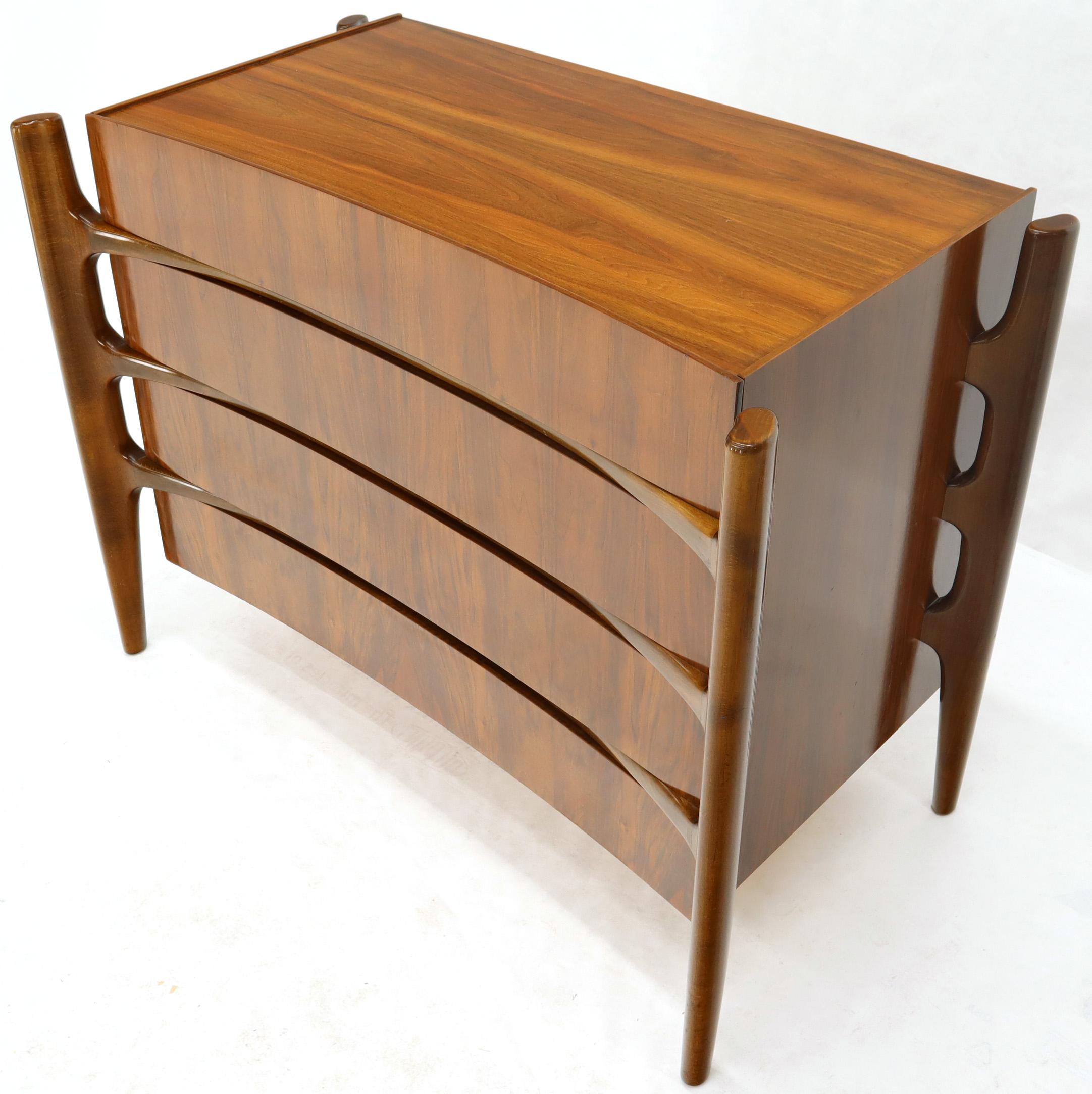 Mid-Century Modern 2 part high chest of 4 drawers by William Hinn. Made in Sweden. Exposed sculptural legs. Vivid lacquered walnut grain. Edmund Spence inspiration.