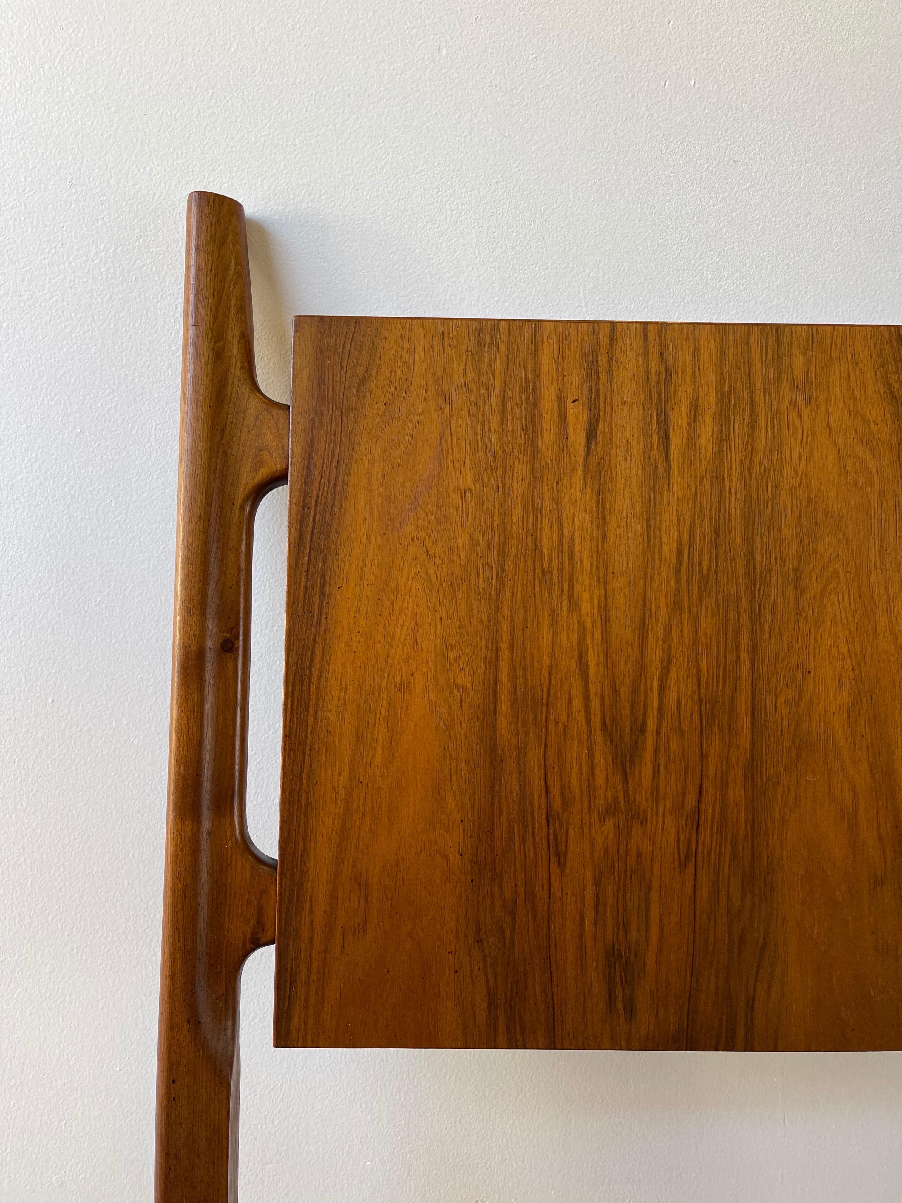 Extremely Rare Find. This Exoskeleton line king size headboard designed by the highly sought after designer William Hinn.

Marked in back with the Hinn stamp, this headboard is in excellent condition with minimal wear.

You will not find