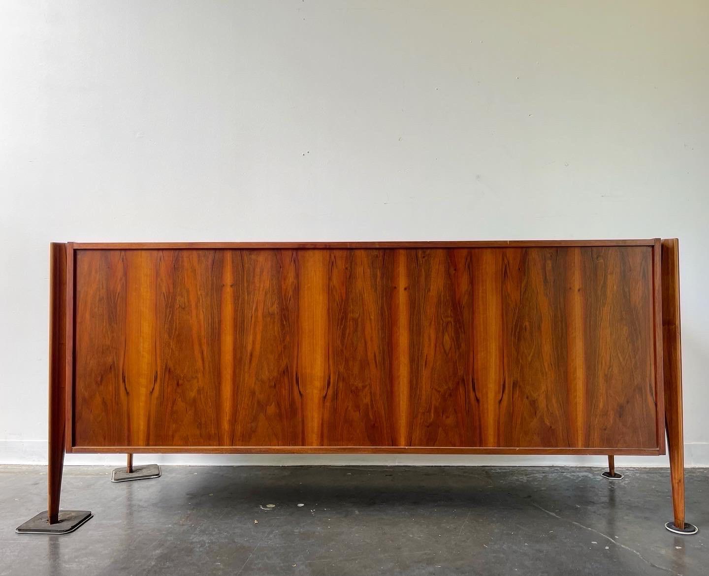 Stunning sculptural lowboy dresser in the style of William Hinn designed by Iorgen Clausen for Brande Mobelfabrik DEnmark circa 1960’s.

This is an exact design as the Hinn dresser but the quality is actually superior in many opinions.

8 Drawer