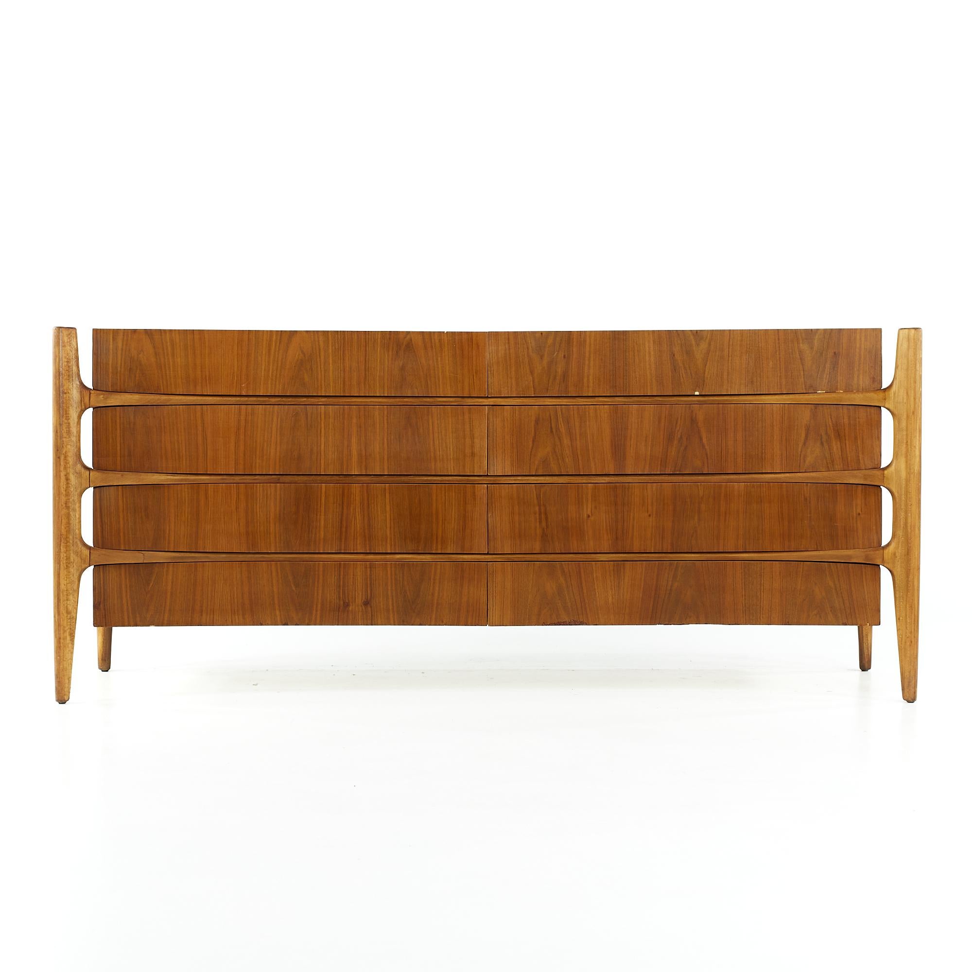 William Hinn midcentury walnut curved front lowboy dresser

This lowboy measures: 78.5 wide x 24 deep x 34 inches high

All pieces of furniture can be had in what we call restored vintage condition. That means the piece is restored upon purchase