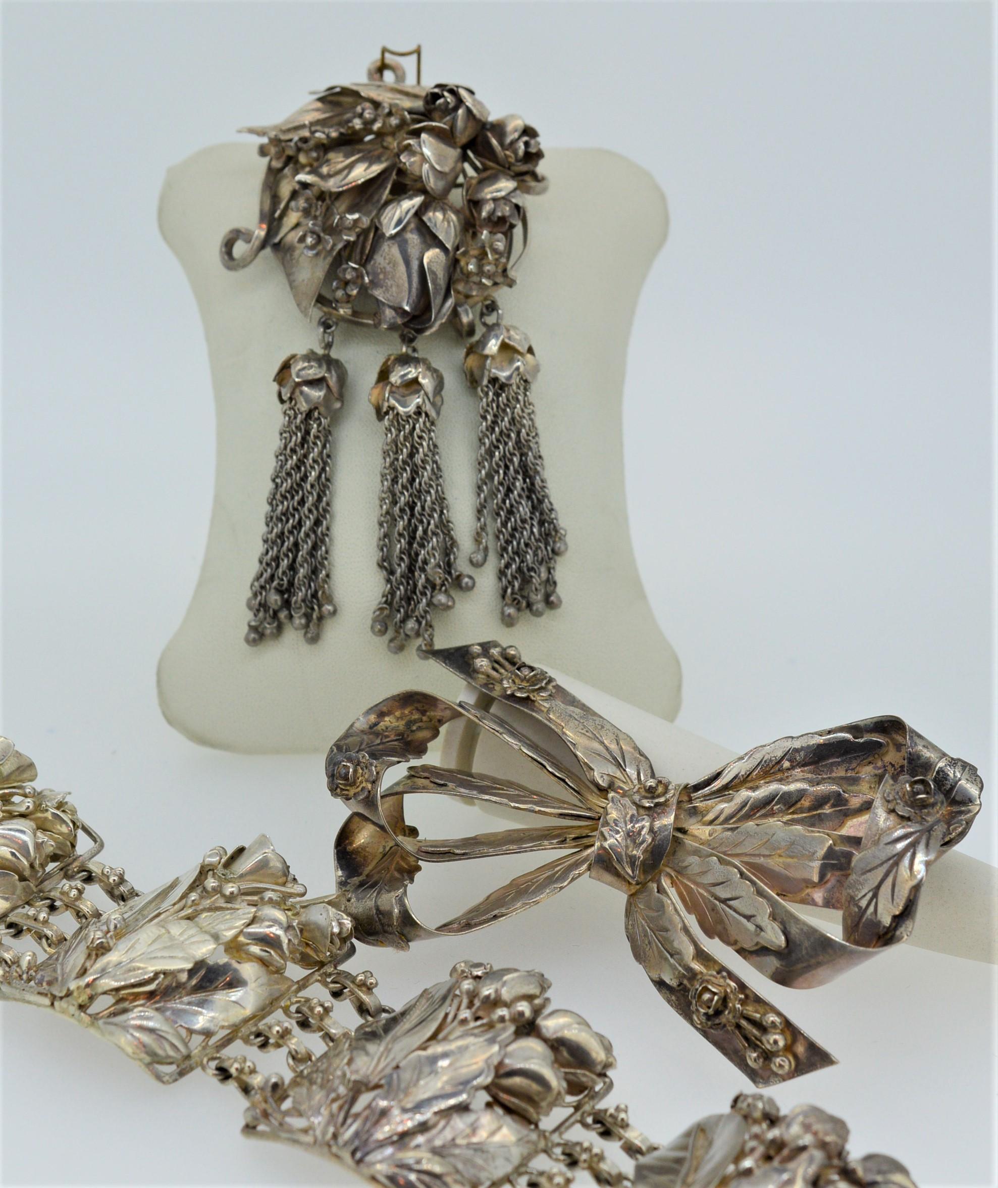 Vintage William Hobe of New York Handcrafted Bracelet, Pendant Brooch & Bow Brooch Set. 
Rare and unusual large Pre-war suite by William Hobe, son of Hobe et Cire  Paris.
Unmatched artisan craftsmanship is carried through to each piece of this