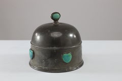 William Hutton probably for Liberty & Co A pewter muffin cover with Ruskin jewel