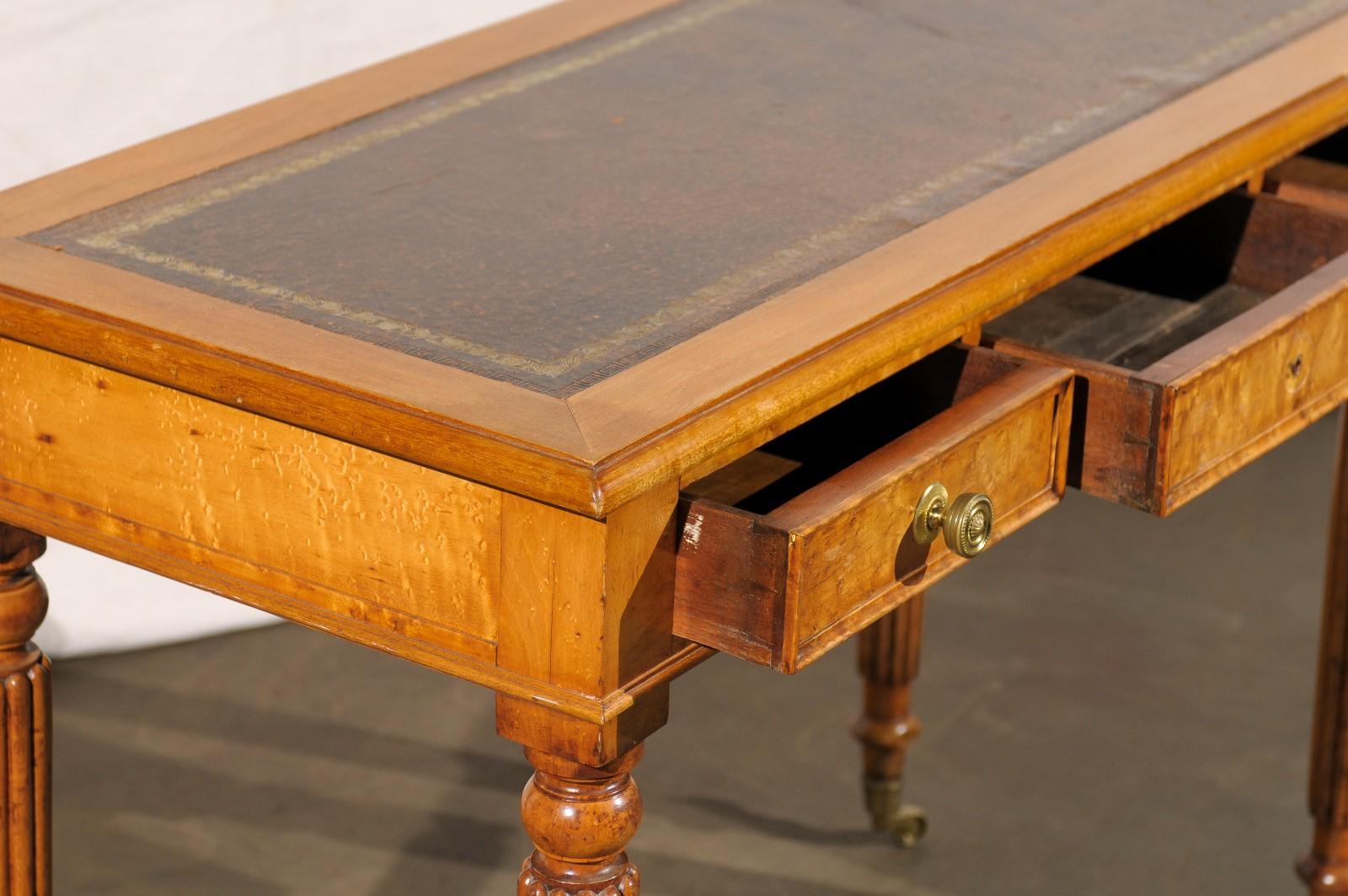 William IV bird's-eye maple writing table desk with leather top, three drawers
Measures: 41.75