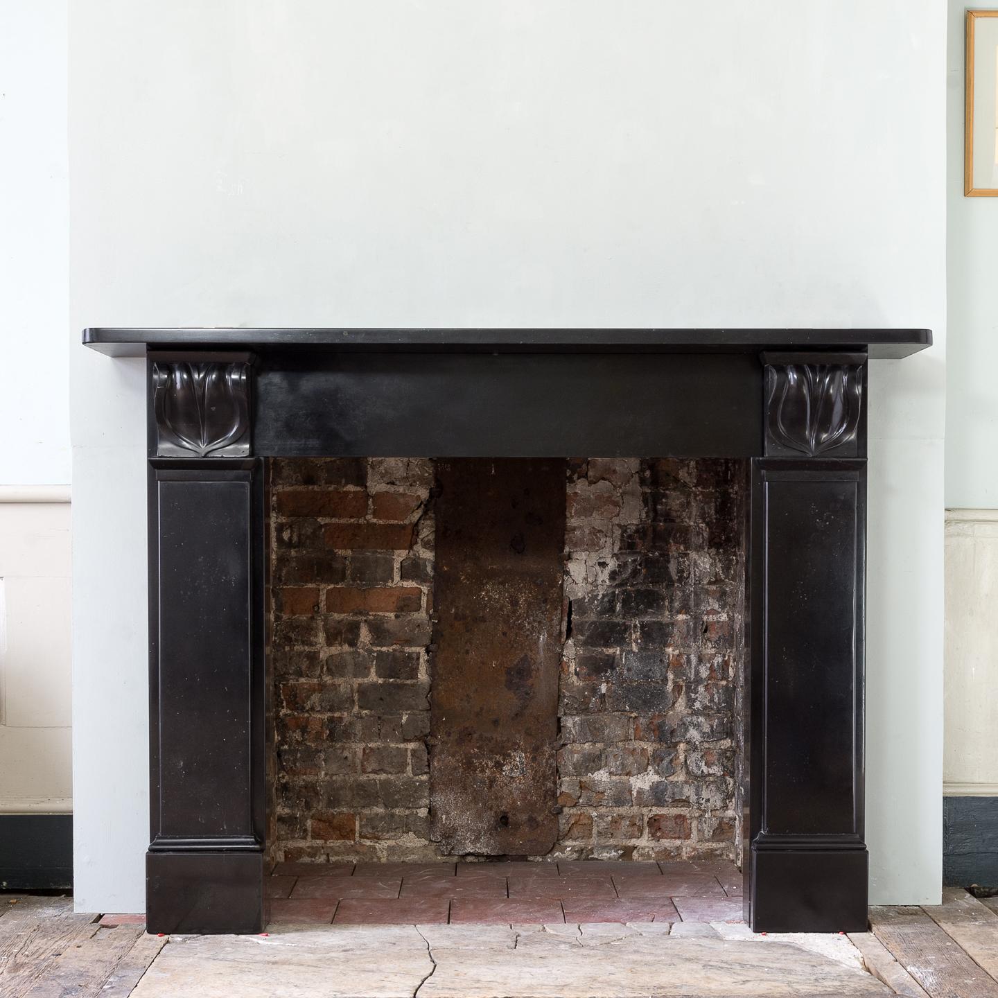 Carved William IV Black Belgian Marble Fireplace For Sale