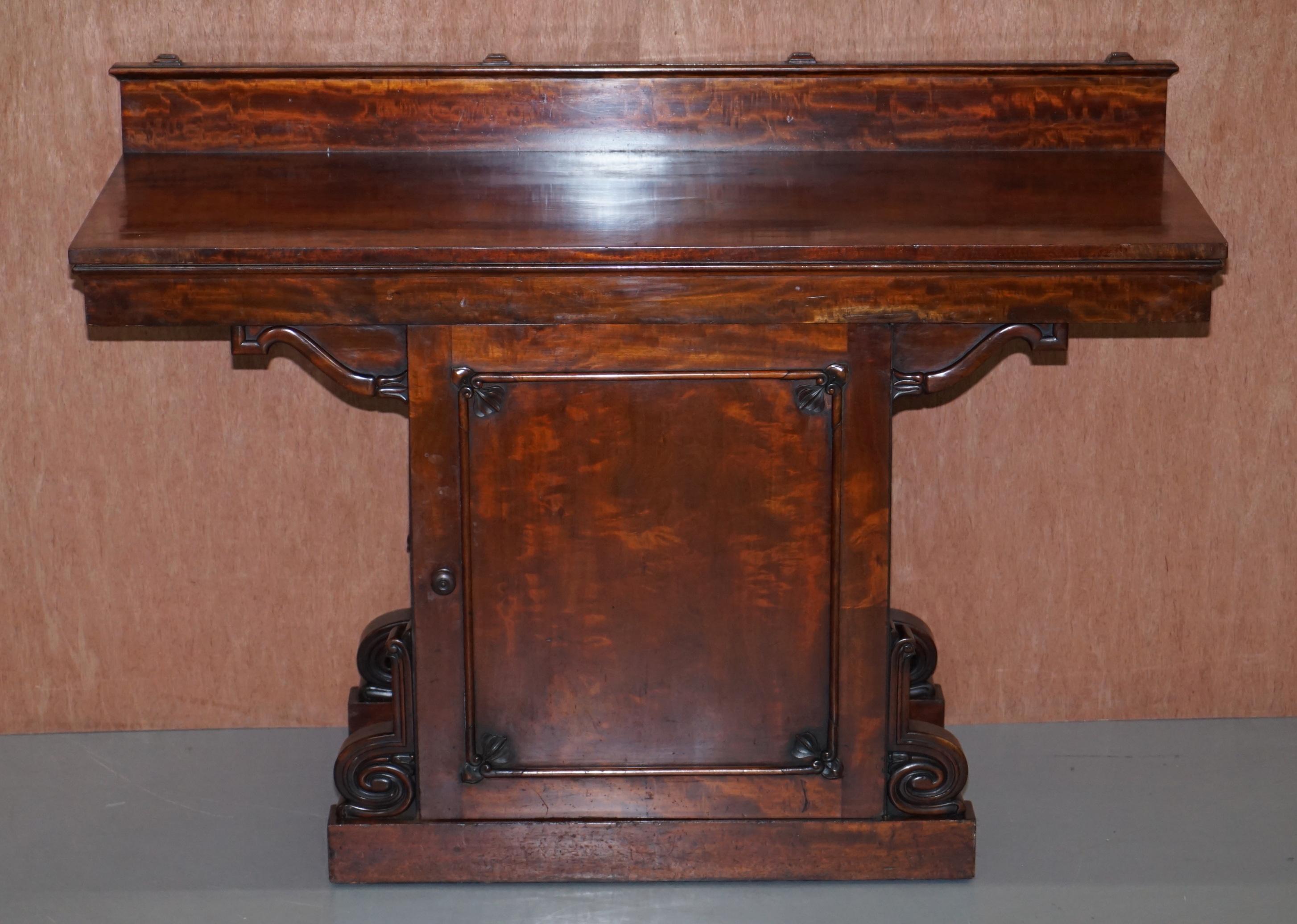 We are delighted to offer for sale this sublime circa 1830 William IV Cuban mahogany wine cellar sideboard

A very fine and significant piece of furniture, the timber is all period Cuban mahogany with ornate carvings all over. The top drawer is