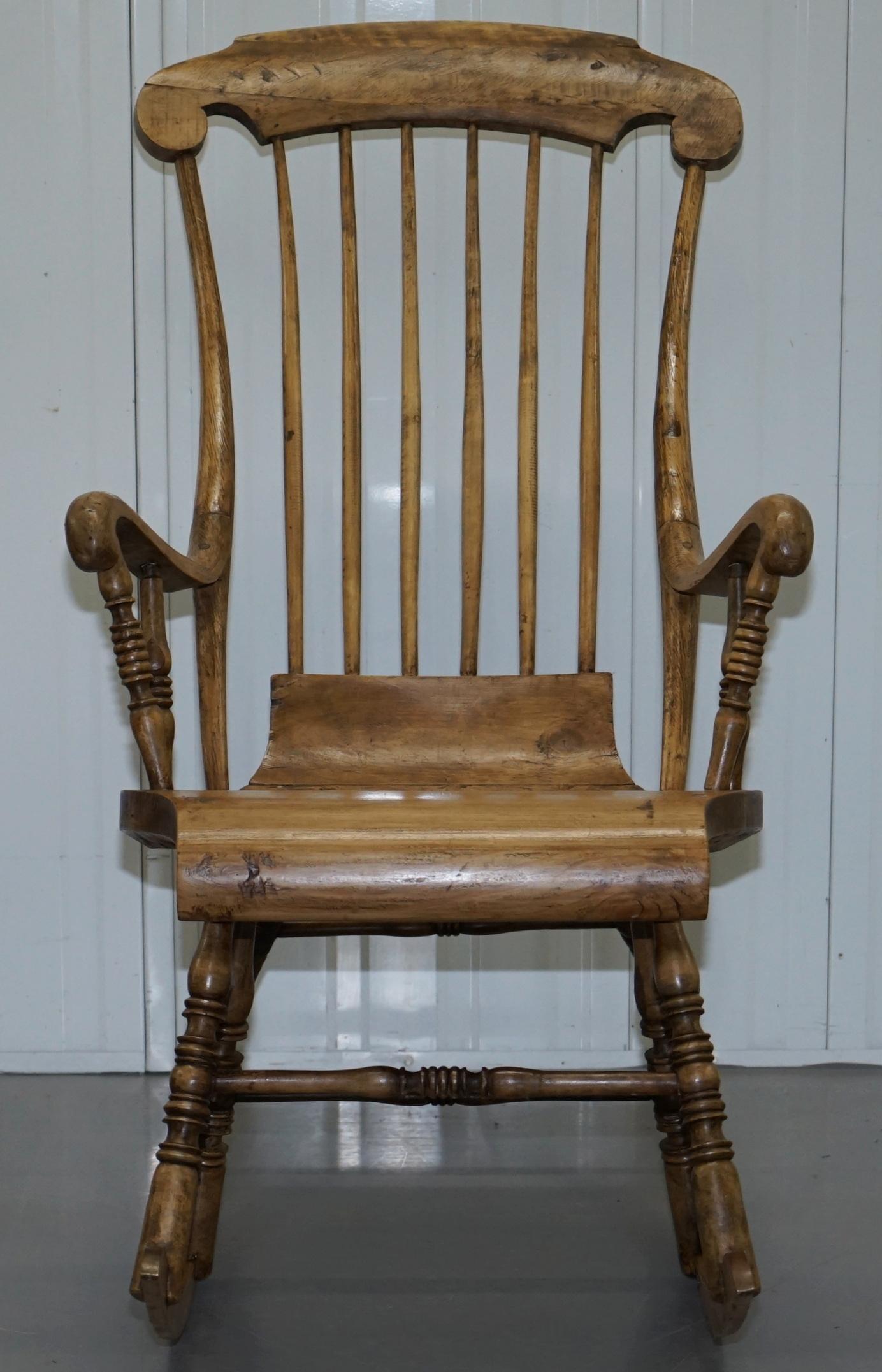 We are delighted to offer for sale this absolutely stunning William IV hand carved solid pine Swedish rocking armchai

This is a very ornate and decorative armchair, the timber is sculptured all over, the lines are so exaggerated compared to