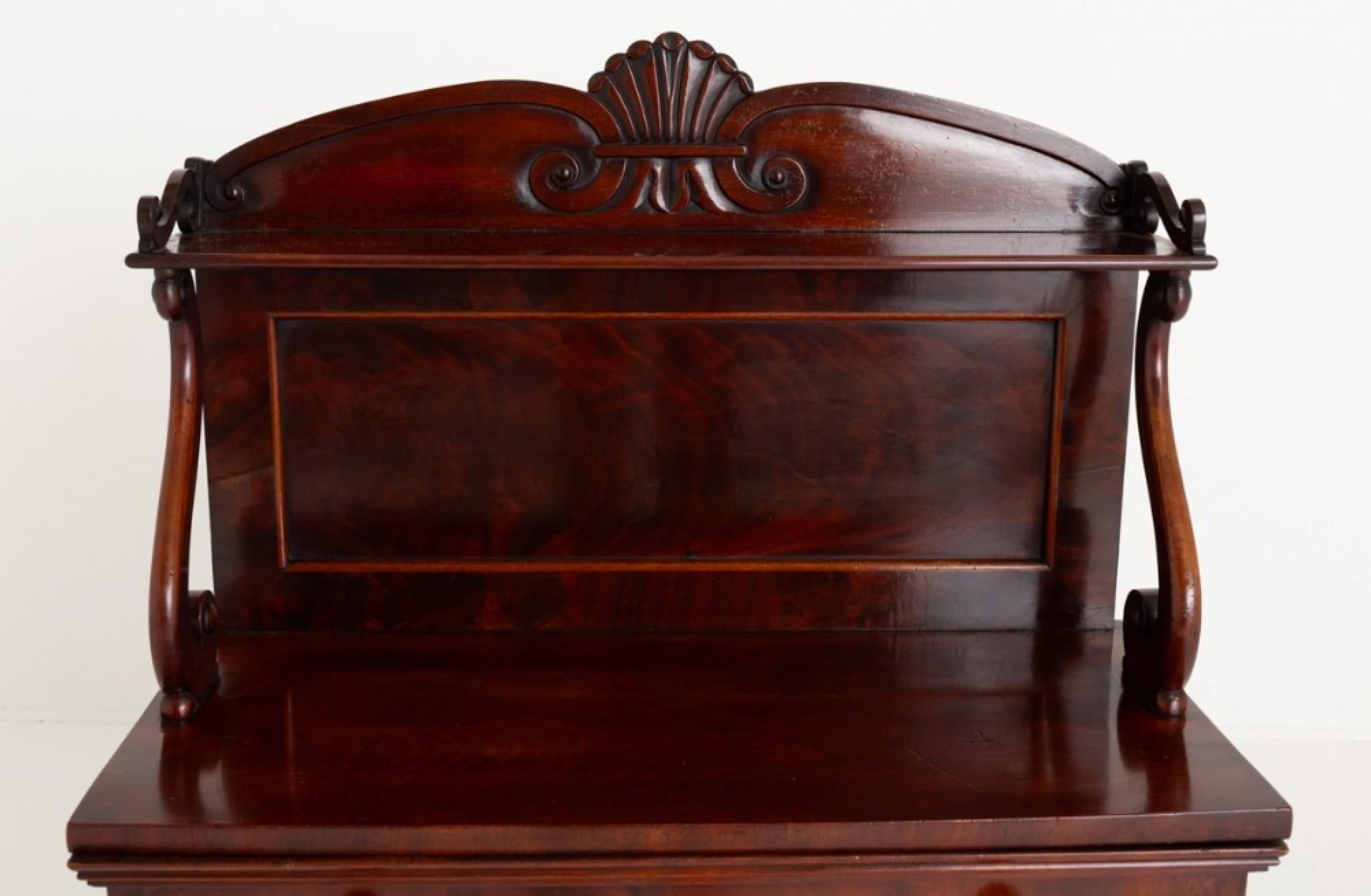You are viewing a gorgeous William IV Mahogany Pier Table.
This Elegant Table Stands Upon Turned Feet,
19th Century
Featuring Turned Columns a Mirrored Back and 1 Oak Lined drawer.
The Superstructure Having Scroll Supports with a Typical William IV