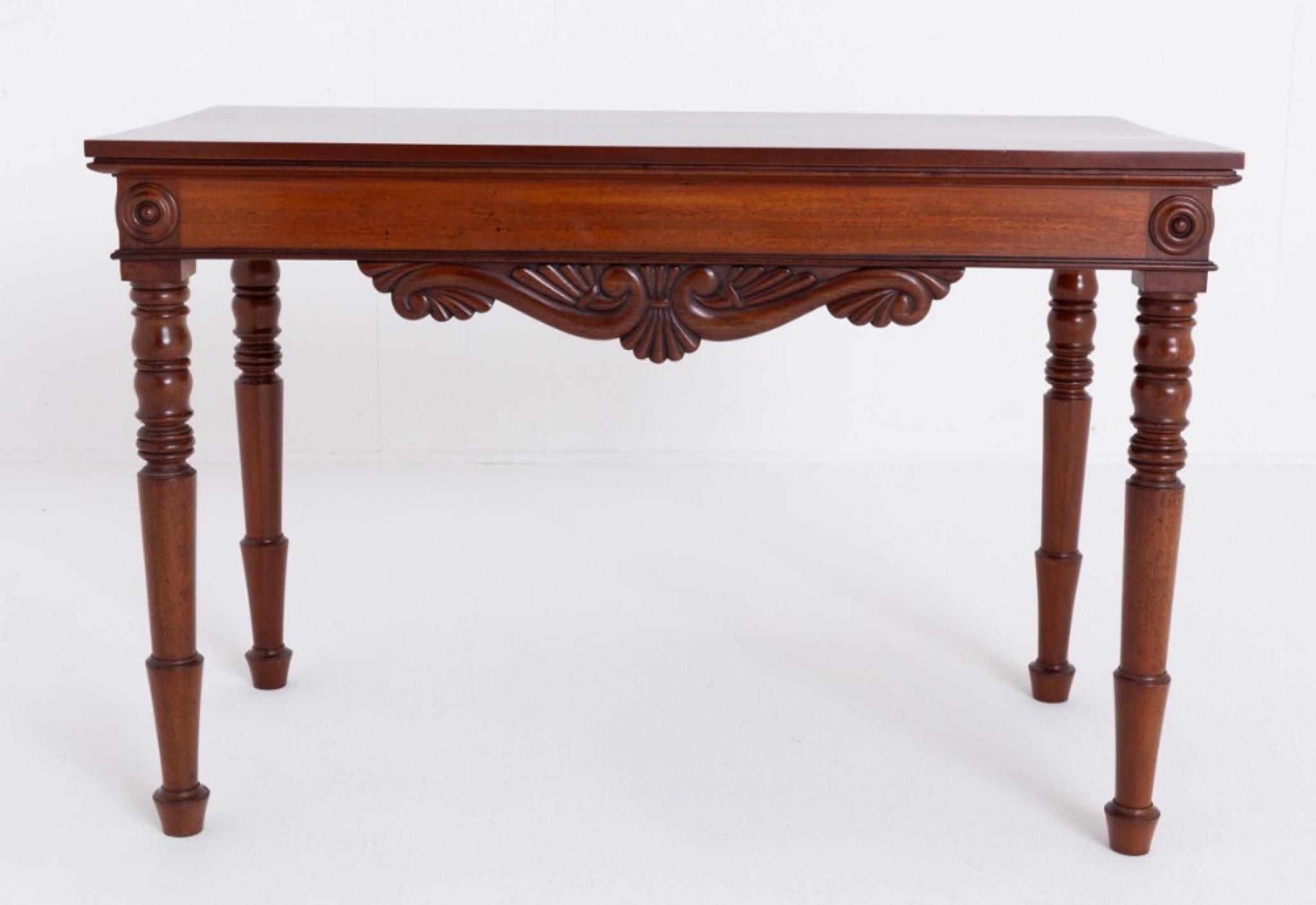 William IV mahogany side table.
This table is raised upon crisp ring turned legs with turned detail to the top of the legs.
Circa 19th Century
The table features a typical William IV carved frieze.
The top of the table being of a plain form.
This
