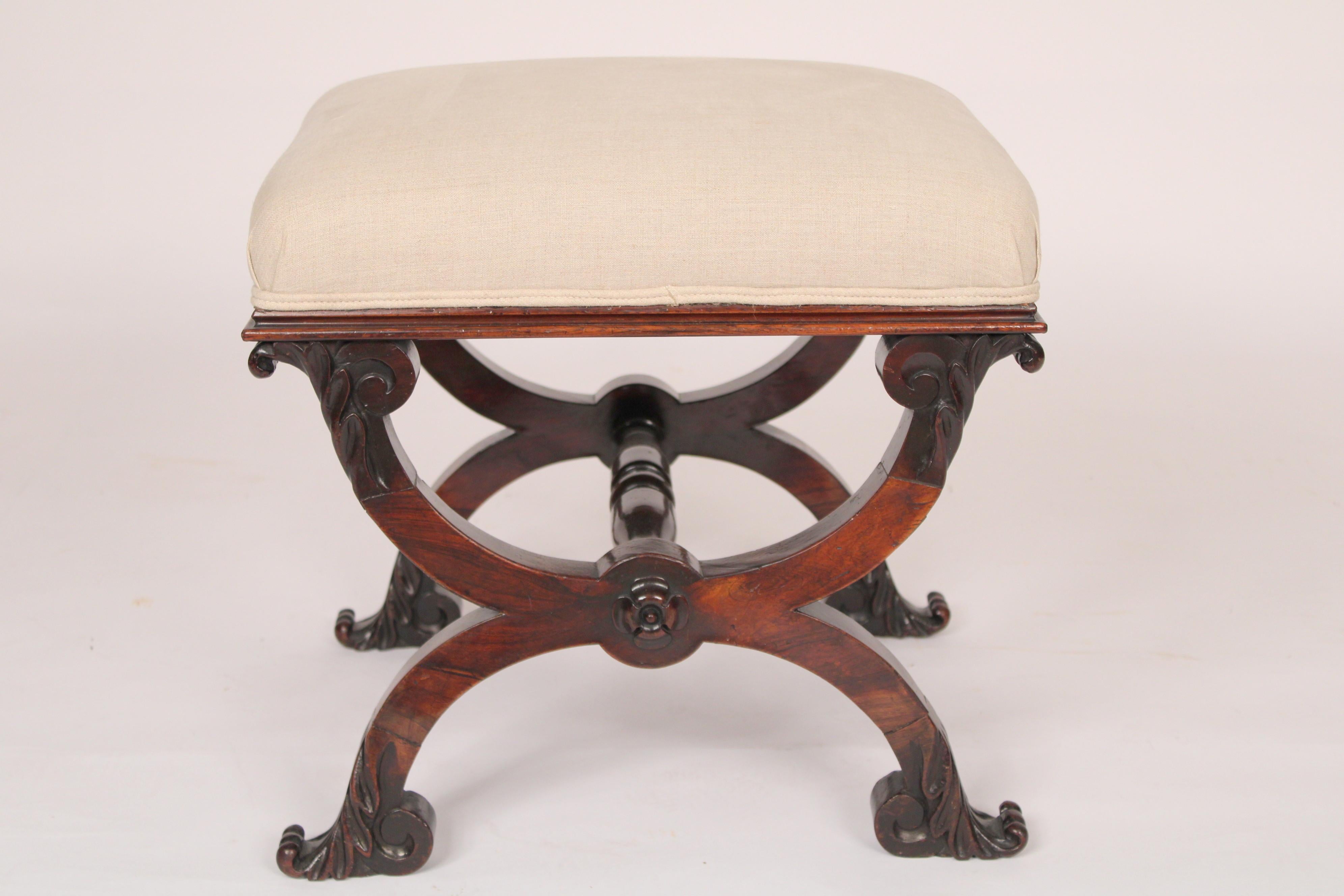 William IV curule form upholstered rose wood bench, circa 1835. With restorations. The feet have possibly been added.