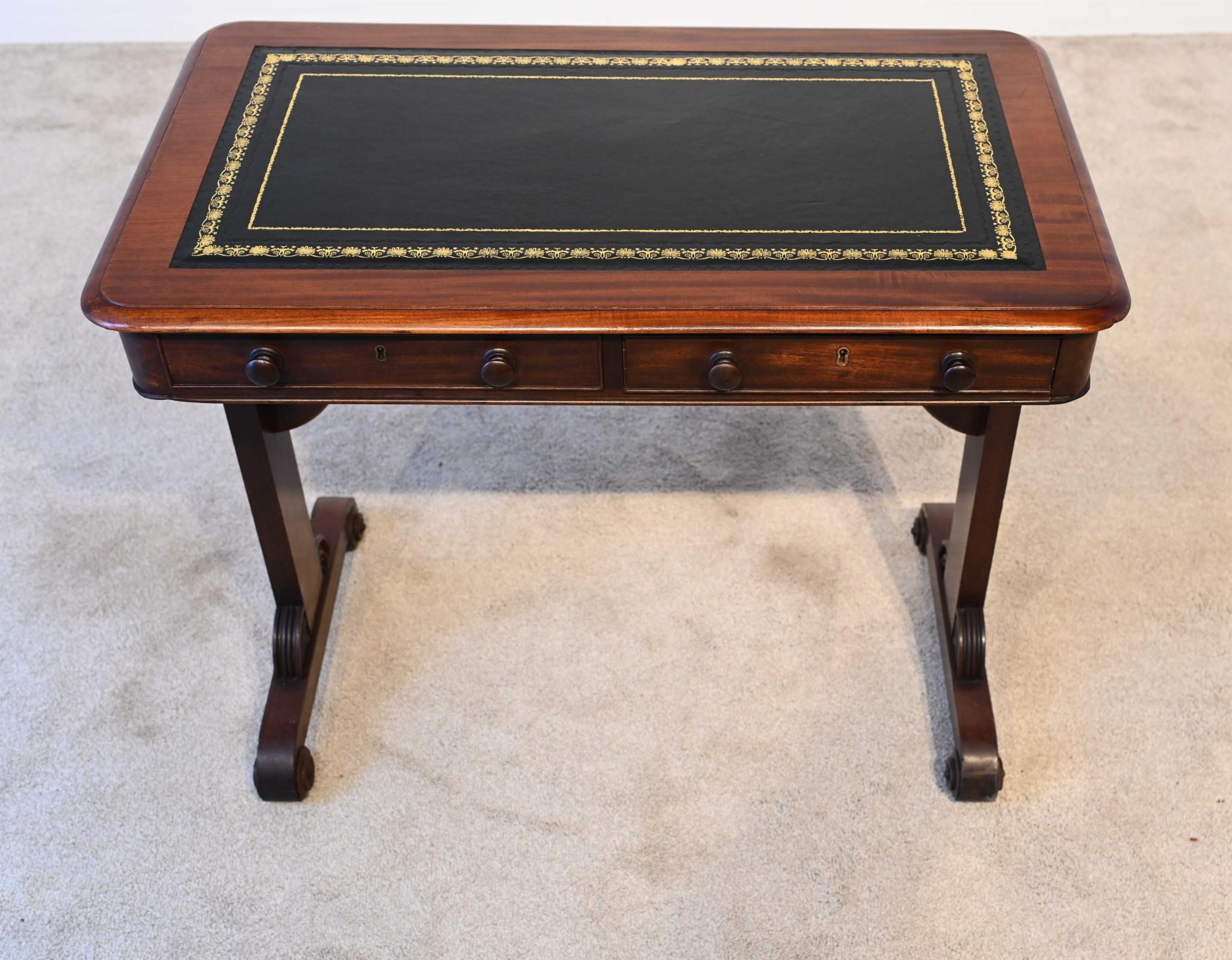 Gorgeous William IV freestanding desk with dummy drawers on the rear
Period William IV circa 1820
Leather writing surface with gilt embossed edges
Clean, elegant and practical piece of English furniture fully restored Purchased from a private