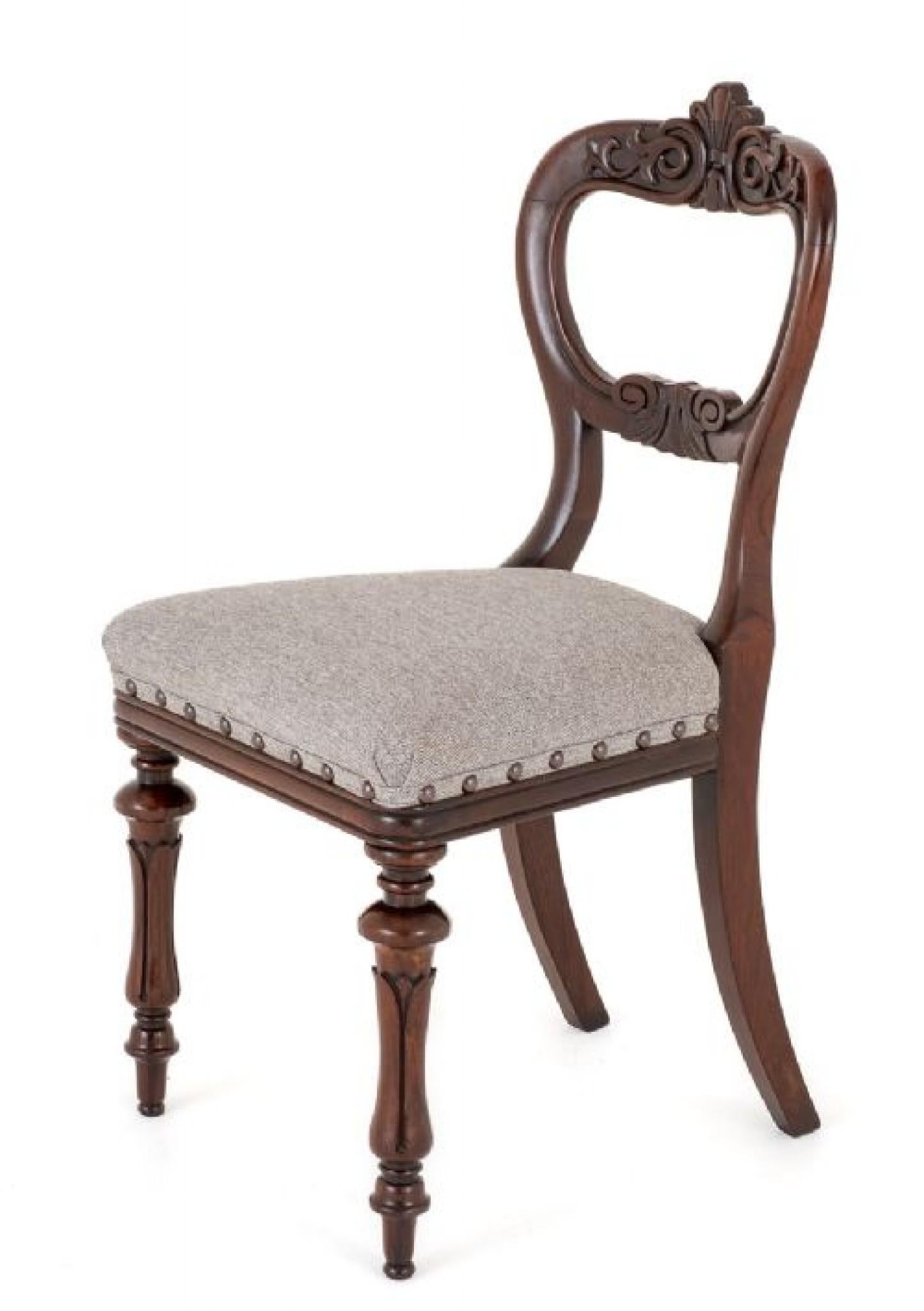 Set of 8 William IV rosewood dining chairs.
These dining chairs stand upon carved and turned front legs with the back legs being of a swept form.
19th century
The balloon backs of the chairs having a carved lower rail and a deeply carved cresting