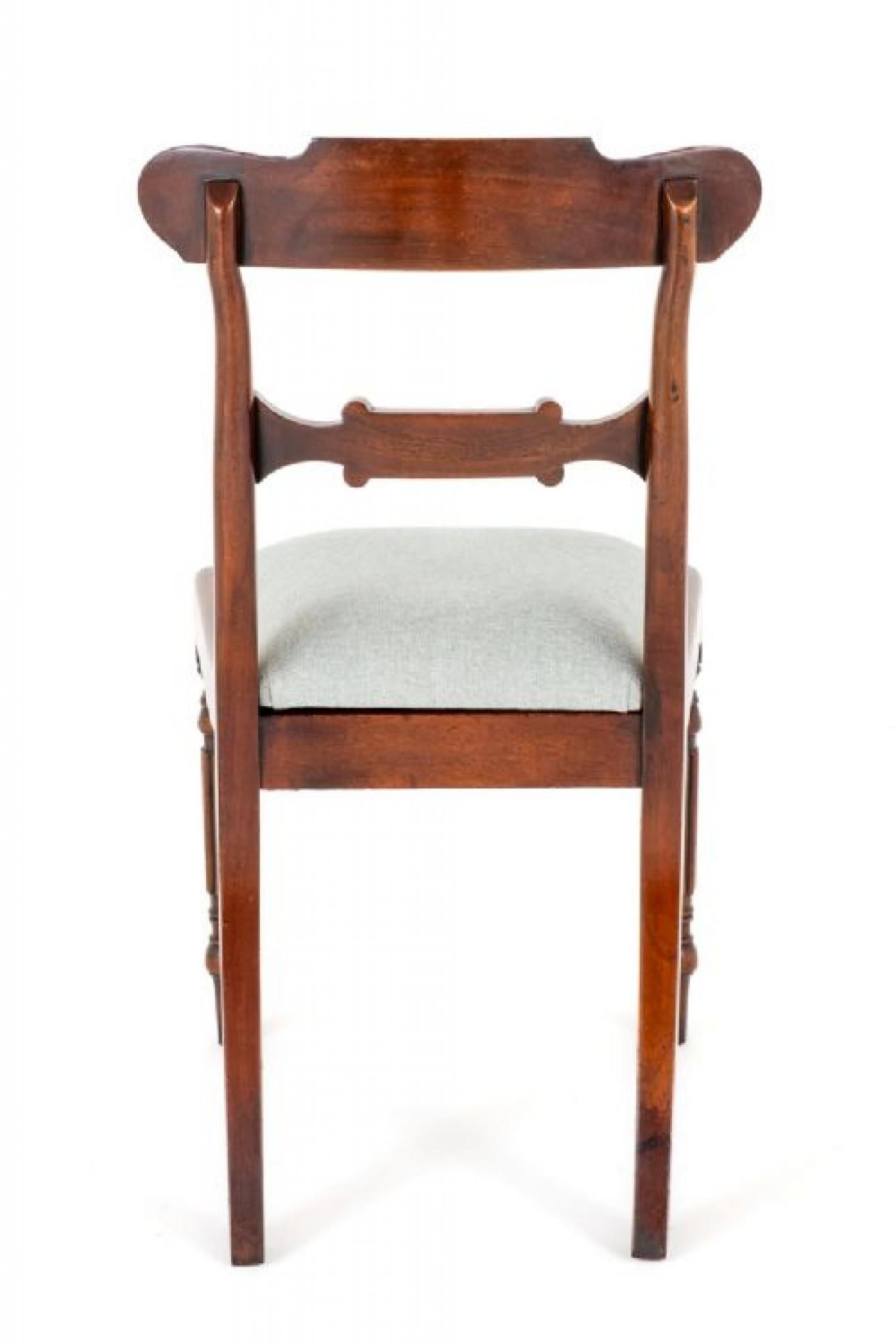 Set of 10 William IV Style mahogany dining chairs.
circa 1900
The chairs stand upon ring turned and fluted front legs with swept back legs.
The front seat rail featuring typical William IV carved tulips.
The lift out seats having recently been