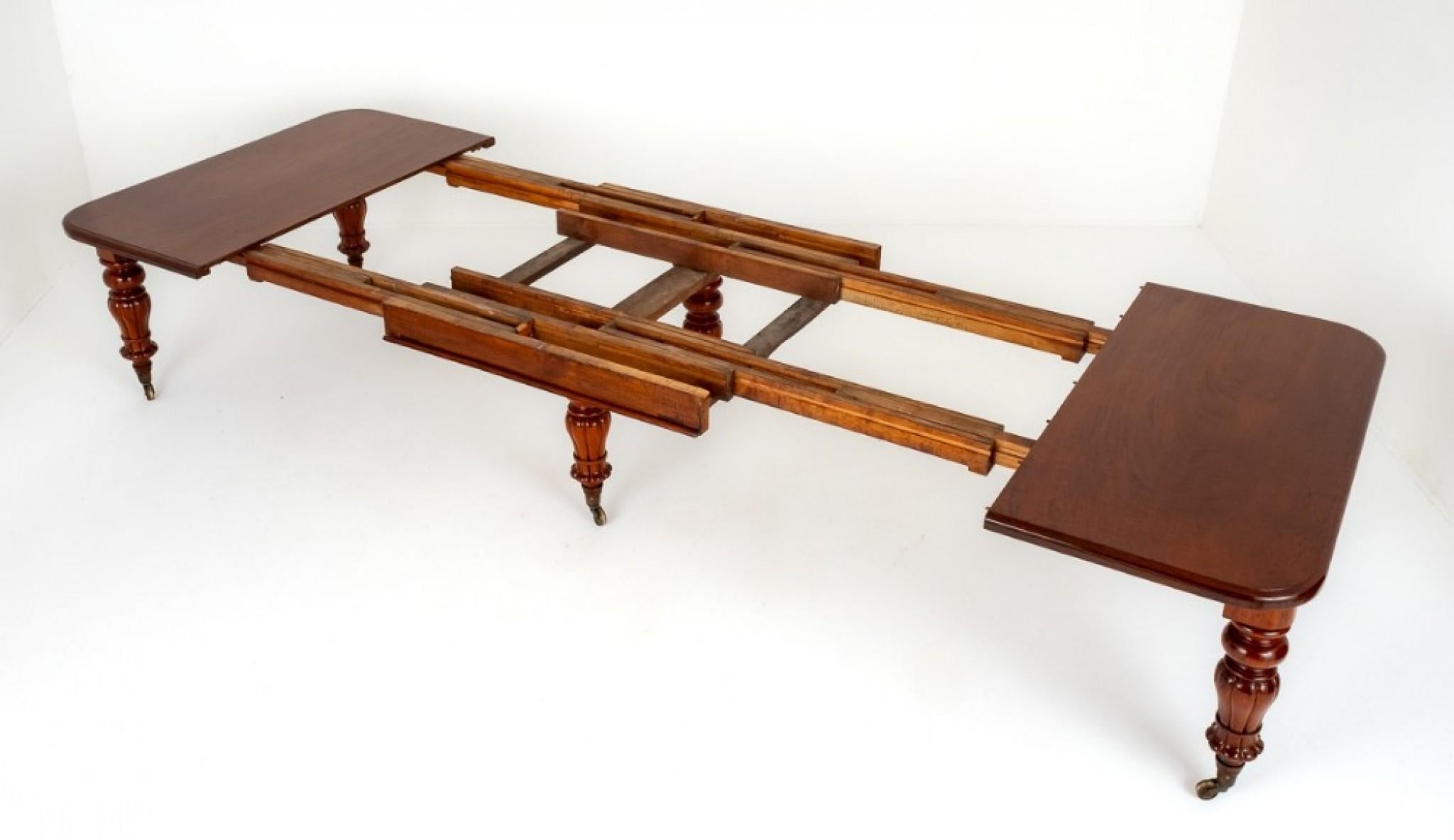 Superb William IV Mahogany Extending Dining Table.
19th Century
This Impressive Table Stands Upon Typical Impressive William IV Legs with Original Castors.
The Table Extends by way of a Pullout Telescopic Mechanism to accept up to 4 Extra