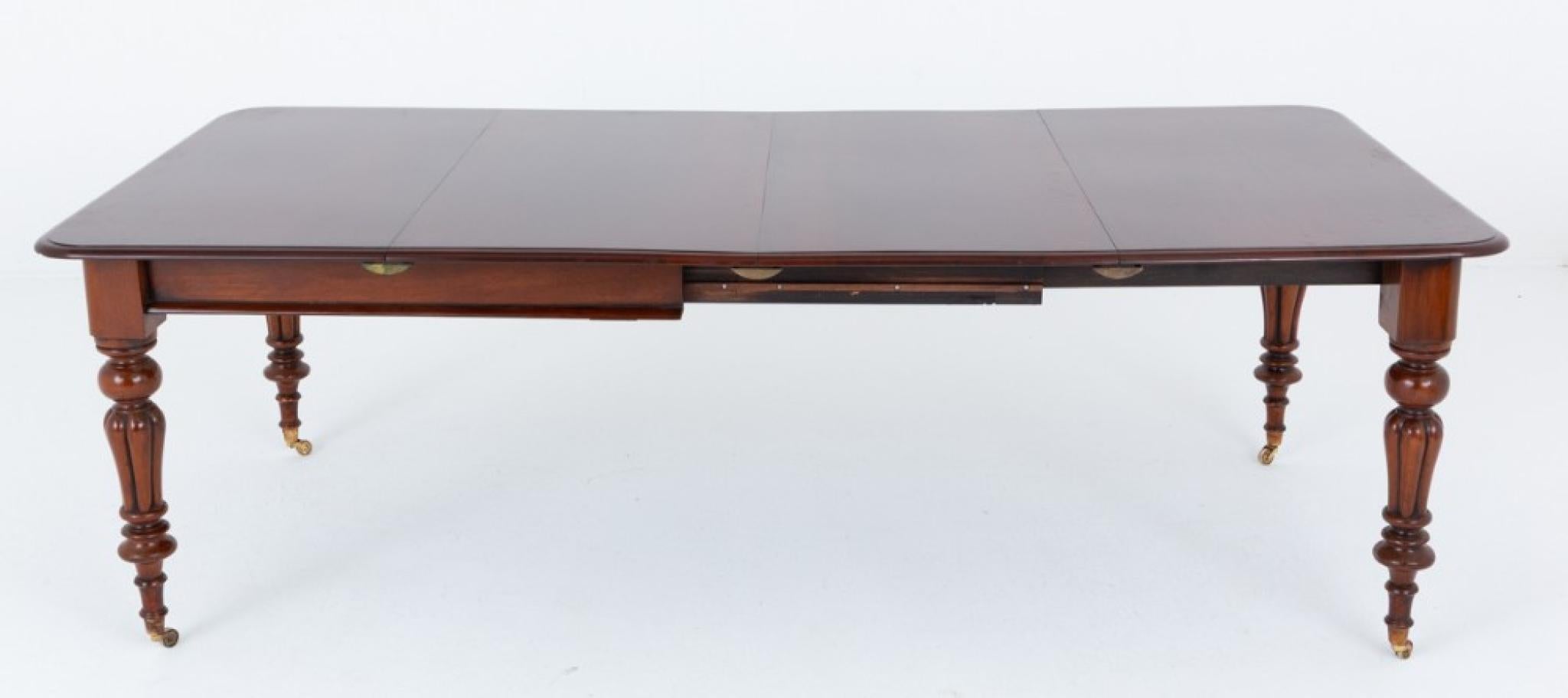 William IV mahogany 8 - 10 seat extending dining table
19th Century antique
This table is raised upon typical william iv turned and fluted legs with brass castors
The table extends by way of a telescopic wind out mechanism to accept 2 extra