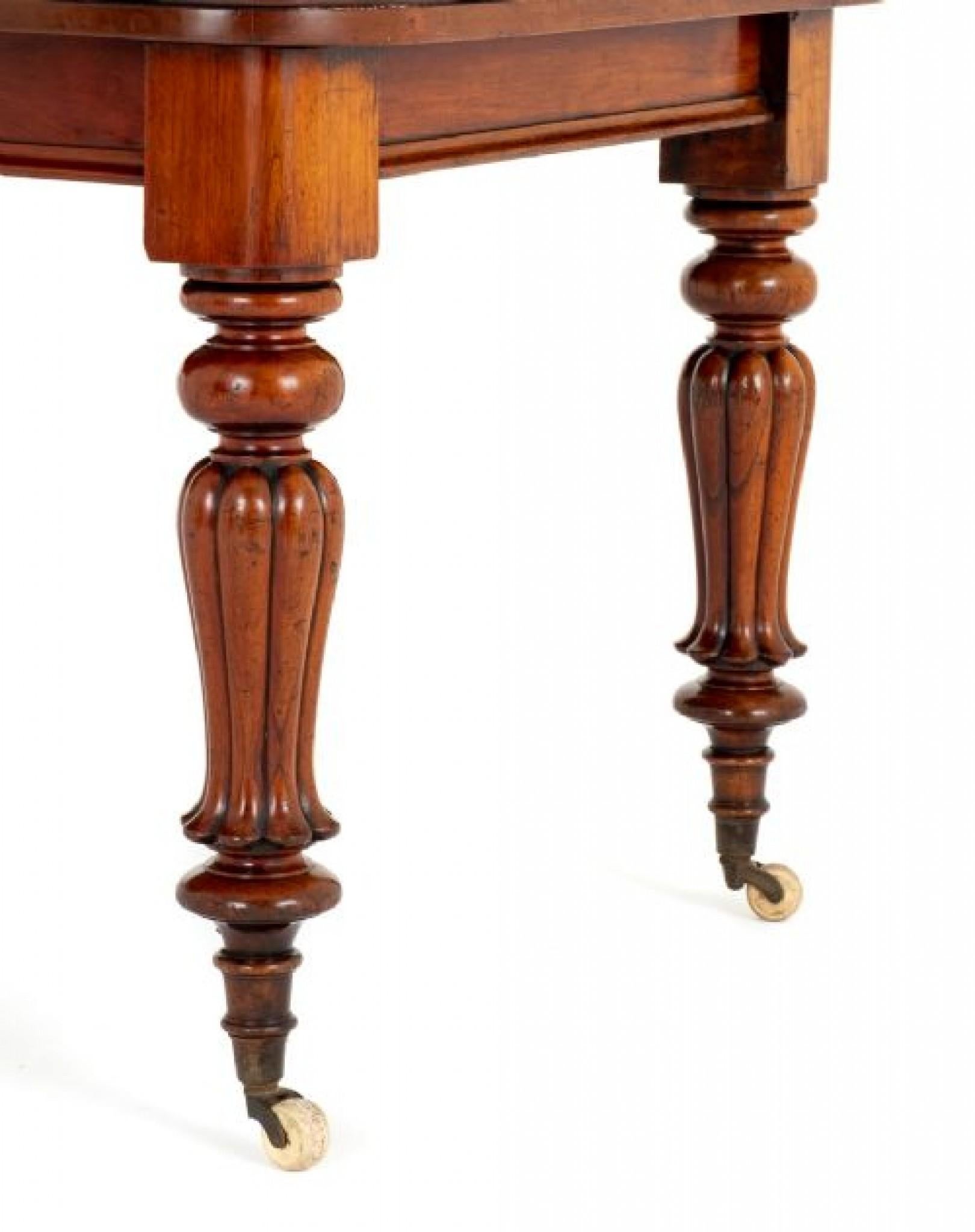 William IV Mahogany Extending Dining Table.
The table stands upon typical William IV turned and fluted legs.
Seating Capacity: The table has the capacity to seat up to 8 people comfortably when fully extended. This makes it suitable for larger