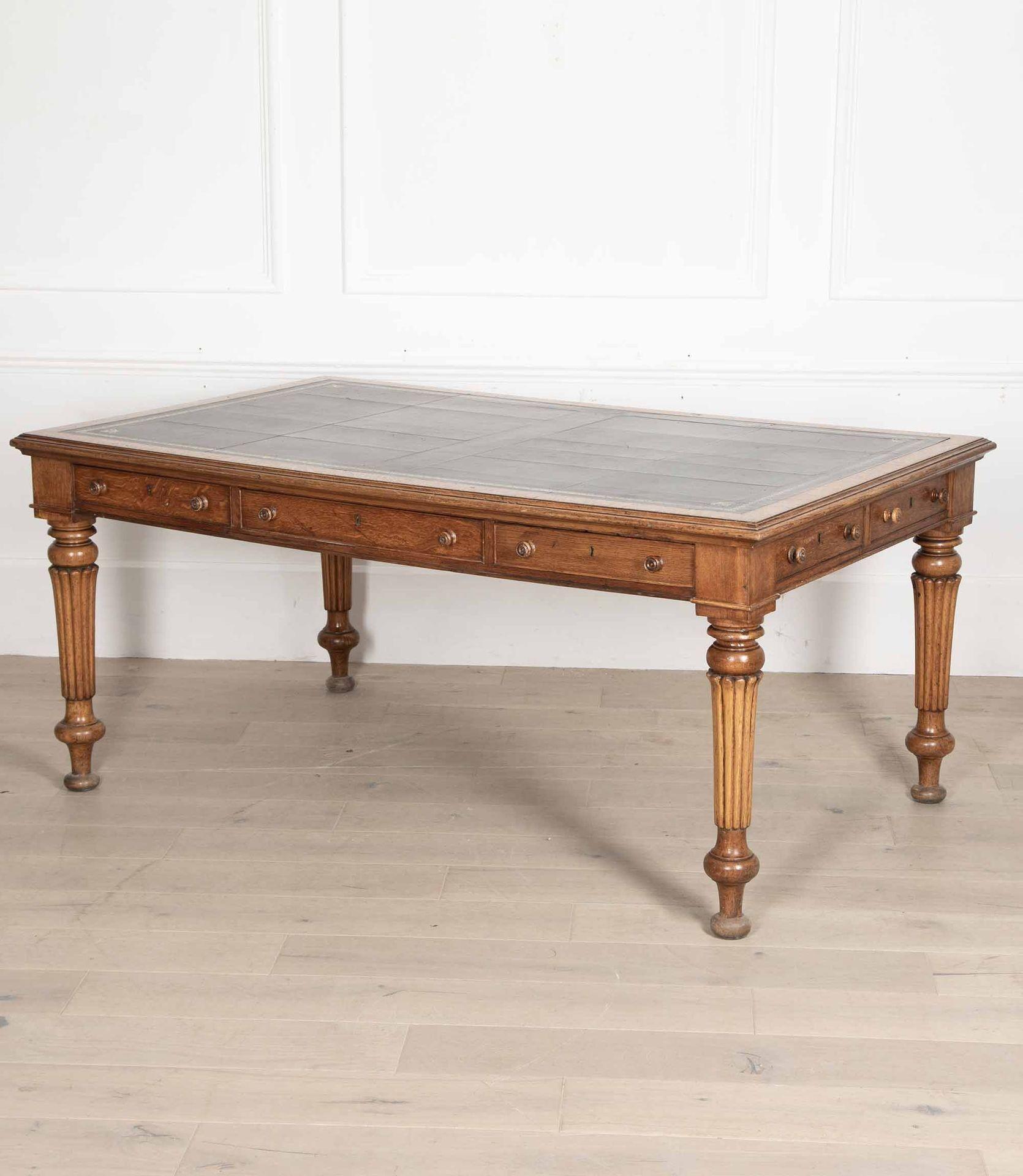 19th Century English William IV double sided oak library table.
Circa 1835.