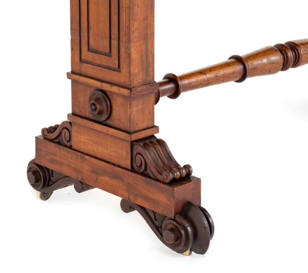 William IV mahogany dumb waiter.
circa 1920
Standing Upon Typical William IV Carved Feet and a Turned Stretcher.
The End Supports Featuring Turned Roundels and Carved Detail.
The Dumb Waiter is of a Telescopic Form to Turn it From a Side Table