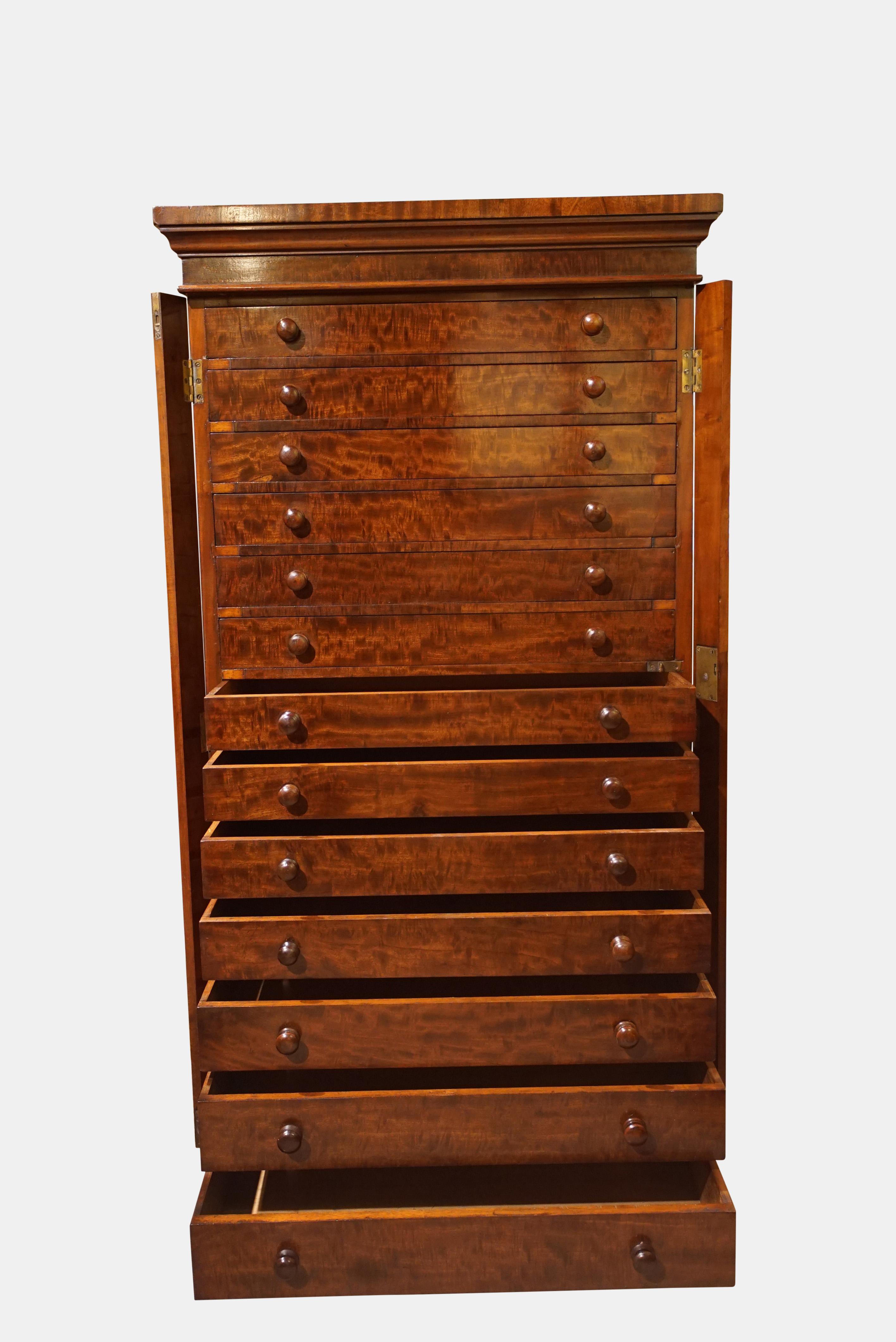 A superb William IV fiddleback mahogany Wellington chest of 13 drawers - Probably a collectors cabinet,

circa 1835.