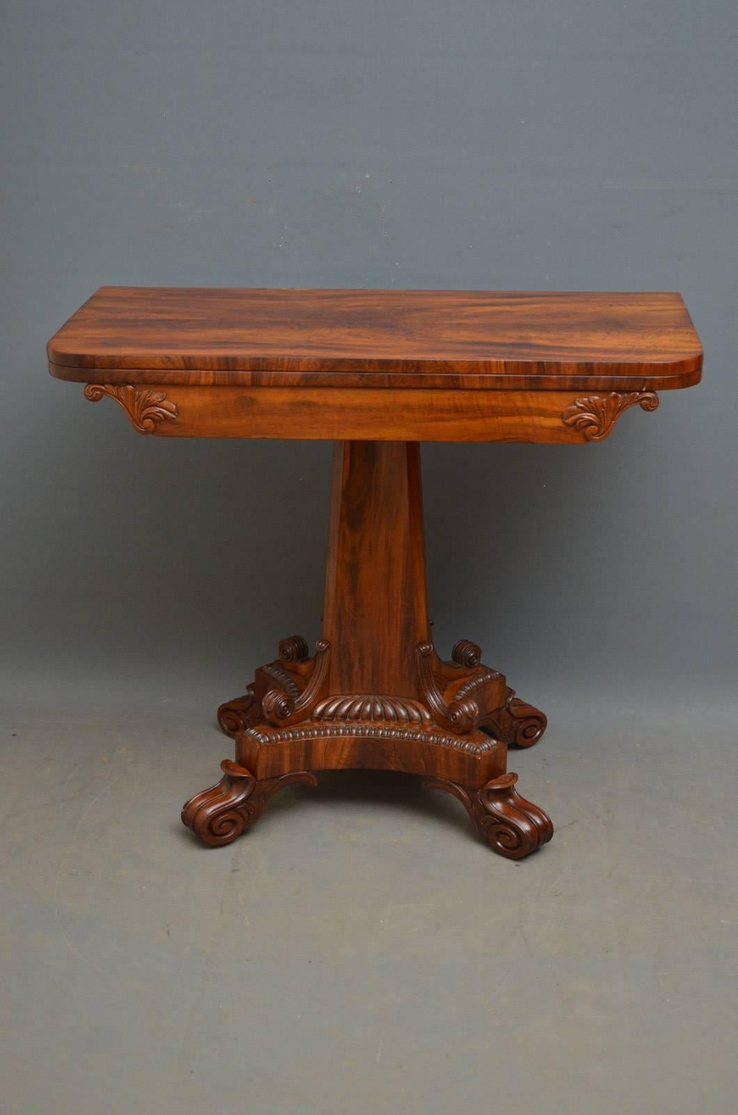 Sn4202 fine quality and very rare William IV card table in goncalo alves, having exceptional grain to the top which opens to reveal green baize interior above carved frieze, standing on elegant column and carved base with fluted decoration