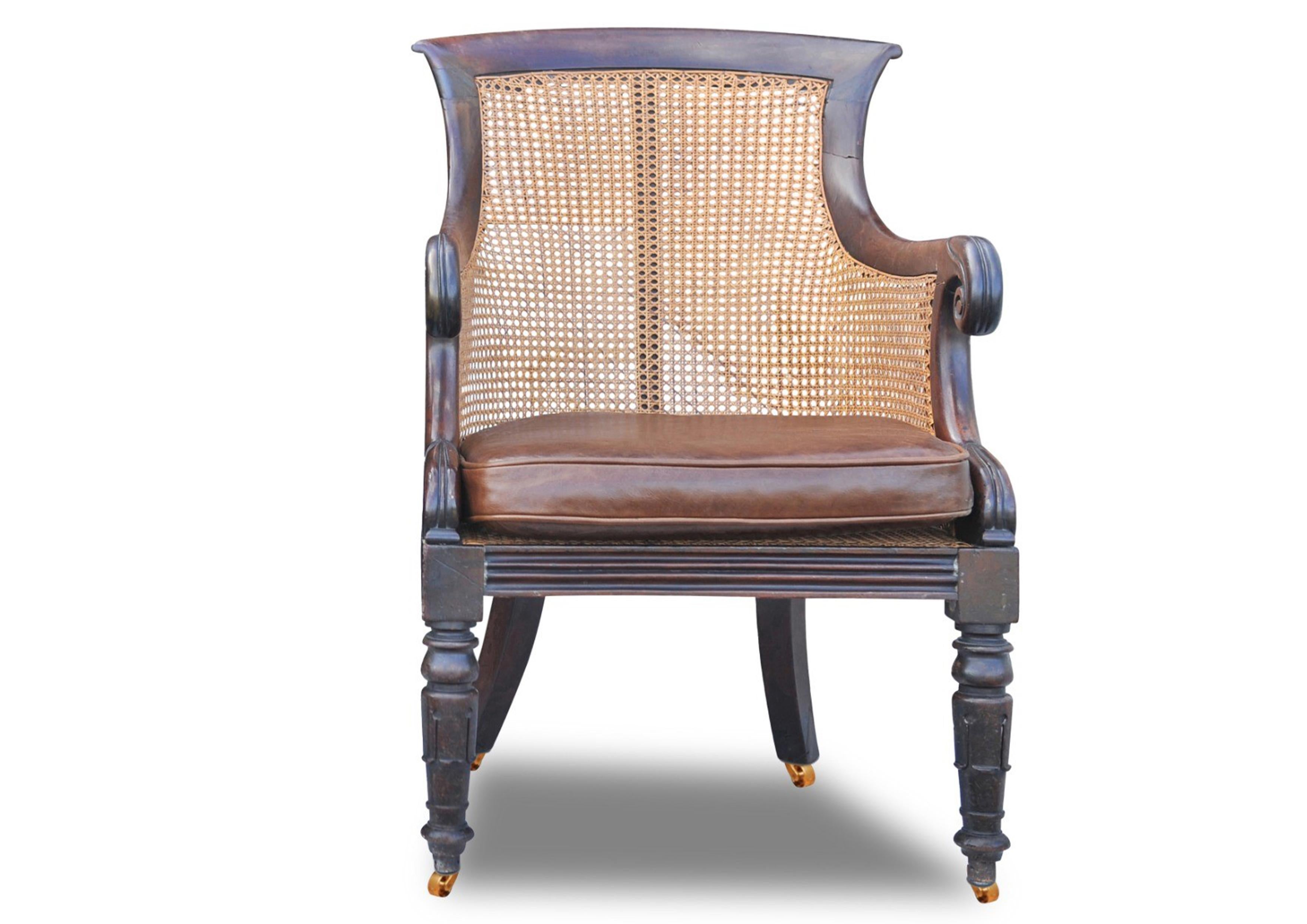 William IV Hardwood Cane Bergere Library Armchair With Scrolled Arms on Castors In Good Condition For Sale In Reading, Berkshire