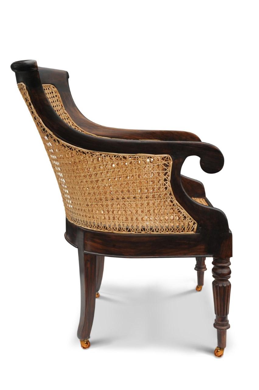 19th Century William IV Hardwood Cane Bergere Library Armchair With Scrolled Arms on Castors For Sale