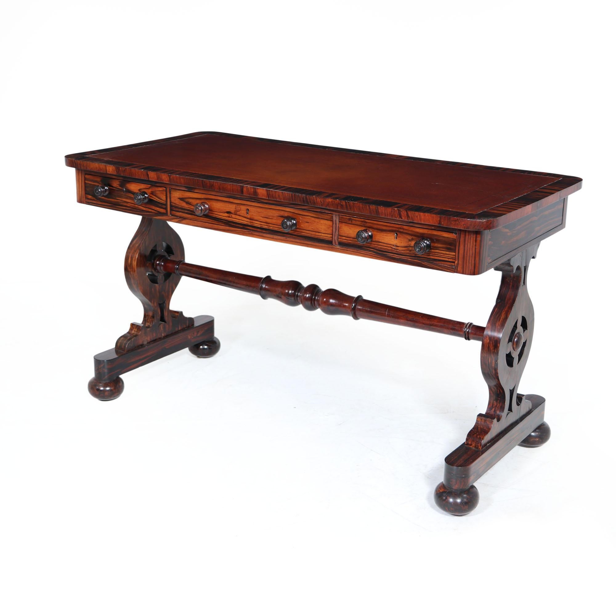 William IV library table
Produced in England in the Mid-19th Century this is a extremely rare example produced in Coramandel having solid drawer fronts thick veneers and simulated uprights, the library table has a tooled Hyde leather top that has