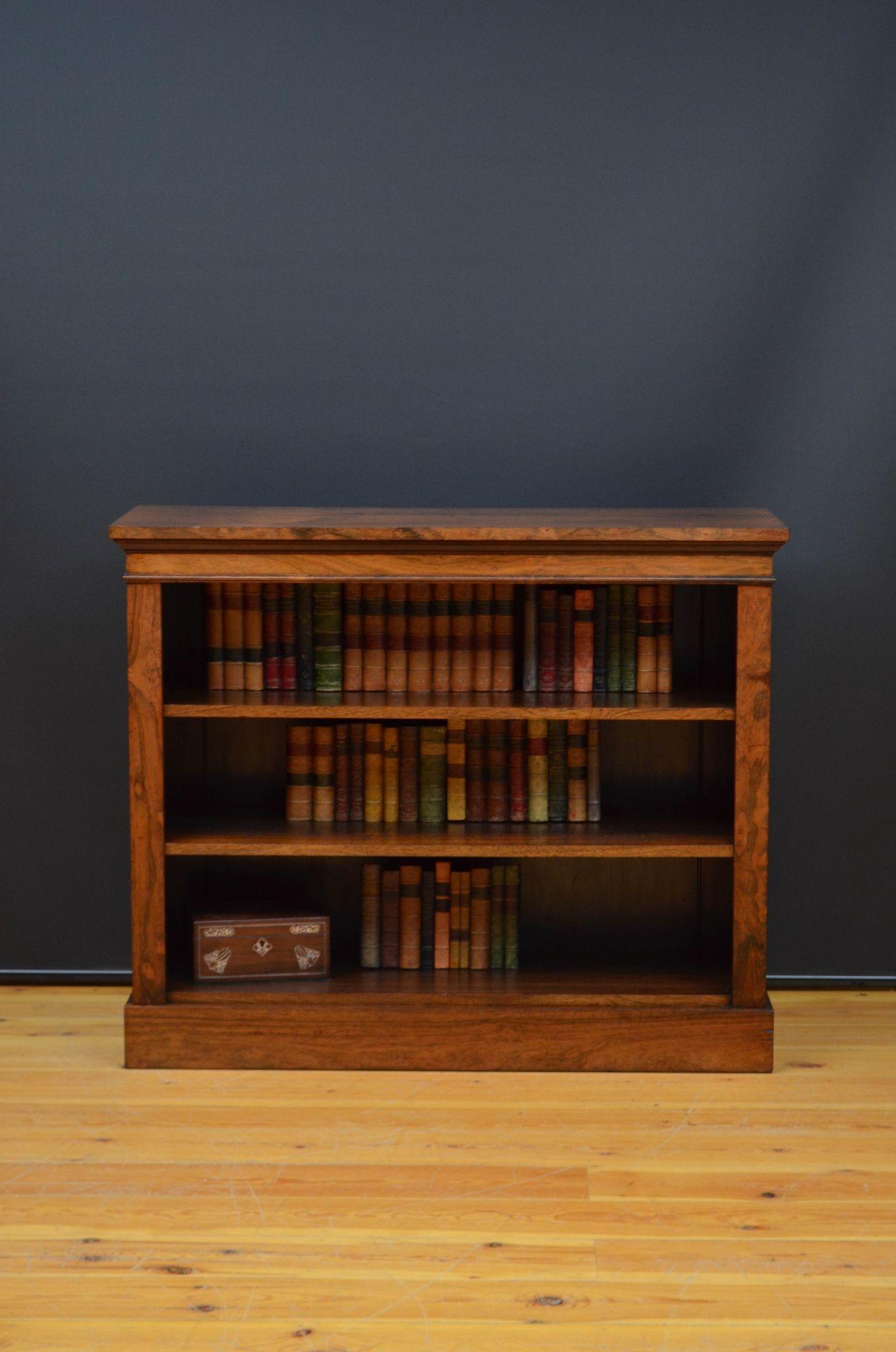 Sn5546 Fine quality William IV rosewood open bookcase of simple and elegant design, having oversailing top with very attractive grain above two height adjustable shelves, all standing on plinth base. This antique bookcase retains its original finish