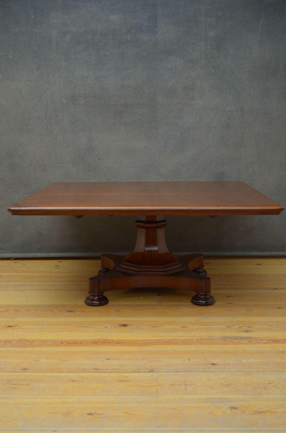 Sn5400 Simple and elegant William IV mahogany coffee table, having figured mahogany top with moulded edge above flat faceted column terminating in shaped base and original bun feet. This antique table has been reduced to coffee table size, it has