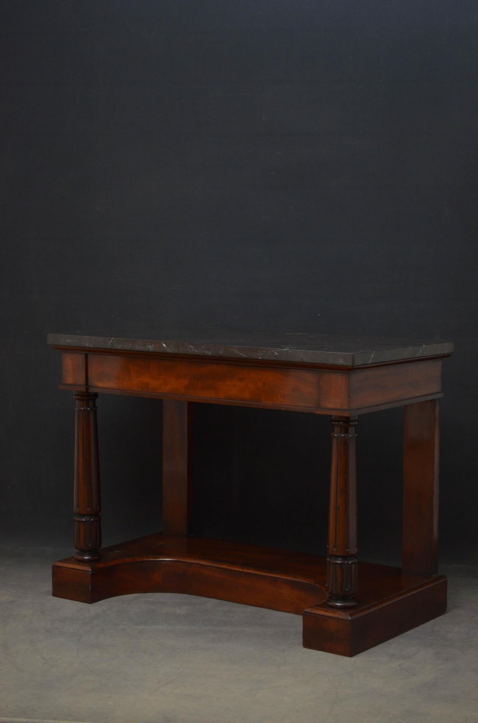 Sn4791 Superb William IV hall table in mahogany, having very attractive granite top above a figured mahogany frieze enclosing a mahogany lined drawer, standing on tapering carved columns with tulip carved capitals terminating in figured mahogany