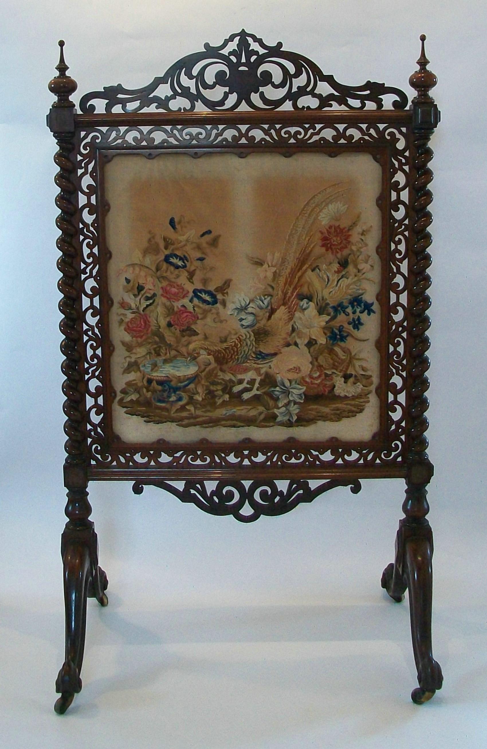 Fine William IV hardwood and tapestry fire screen - exceptional hand made quality with warm aged patina - featuring fantastic fretwork and barley twist supports with delicate turned finials surrounding the original needlepoint tapestry hand stitched
