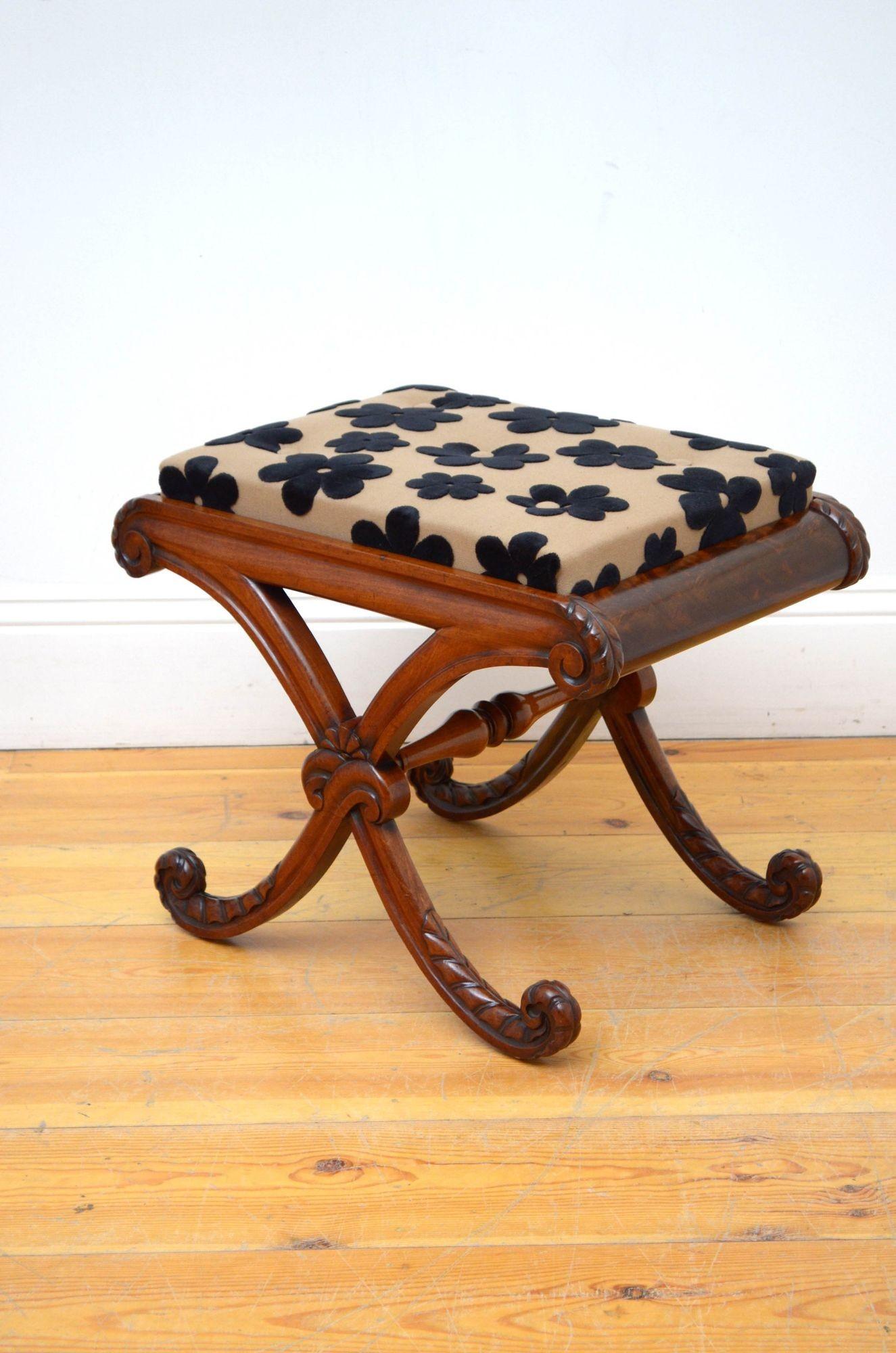 Sn5447 Attractive William Iv mahogany dressing table stool having newly recovered buttoned, drop in seat (brown fabric with black flowers) in finely carved X frame with decorative foliage carvings and turned stretcher. This antique stool is in home