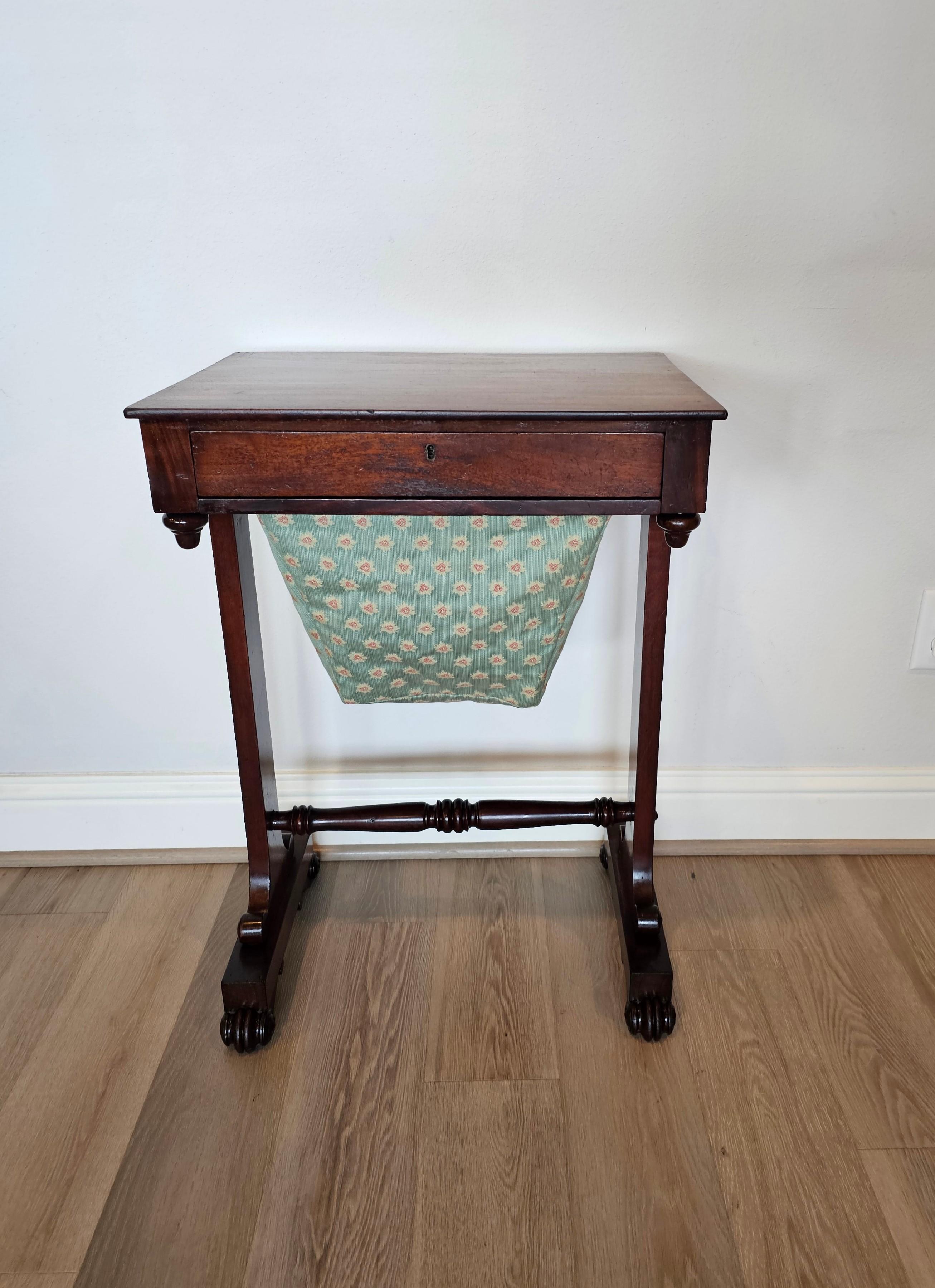 A scarce nearly 200 year old English William IV Period rosewood and mahogany sewing stand work table with beautifully aged warm rustic patina. circa 1830s 

Combining sophisticated elegance, warmth, classic simplicity, and functional design, this
