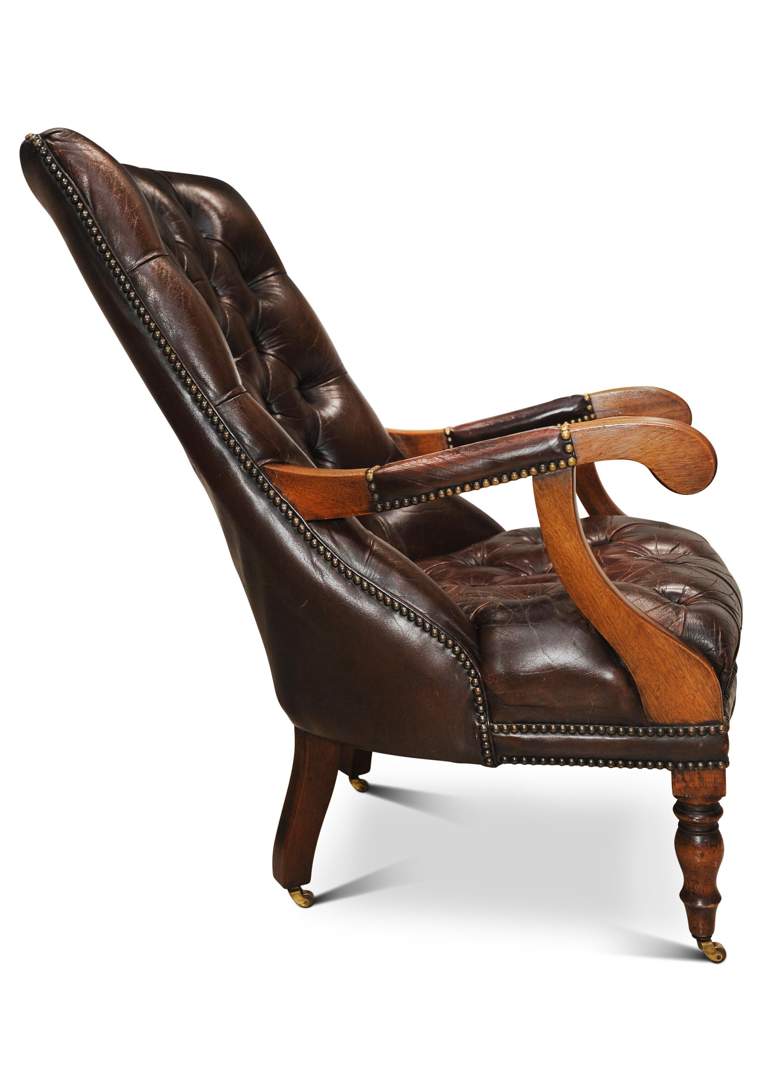 19th Century William IV Polished Antique Brown Leather Chesterfield Library Chair On Castors For Sale