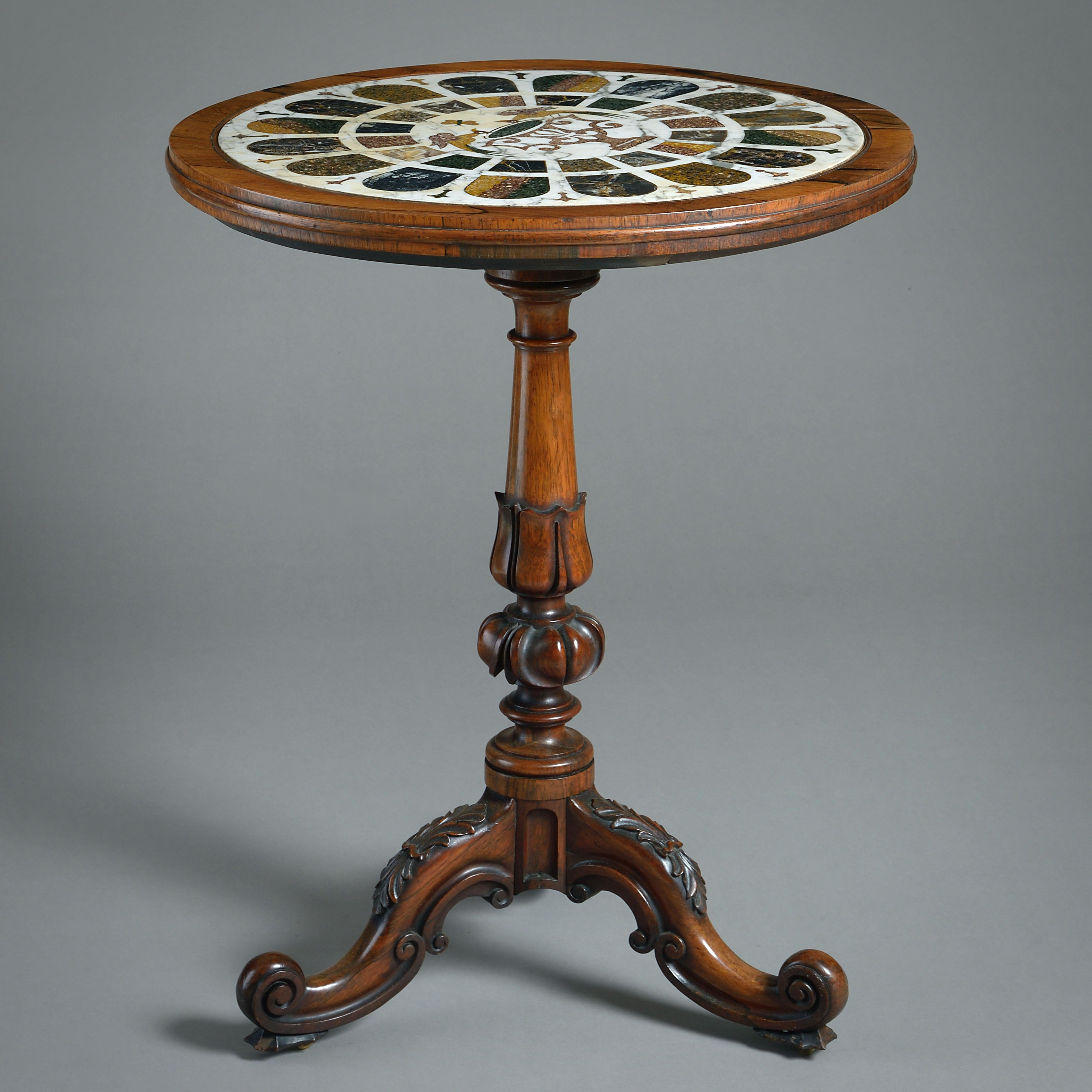 MESA DE PALISANDRO Y MÁRMOL DE WILLIAM IV, HACIA 1835.

La parte superior circular con incrustaciones de dos pájaros bebiendo de un jarrón.