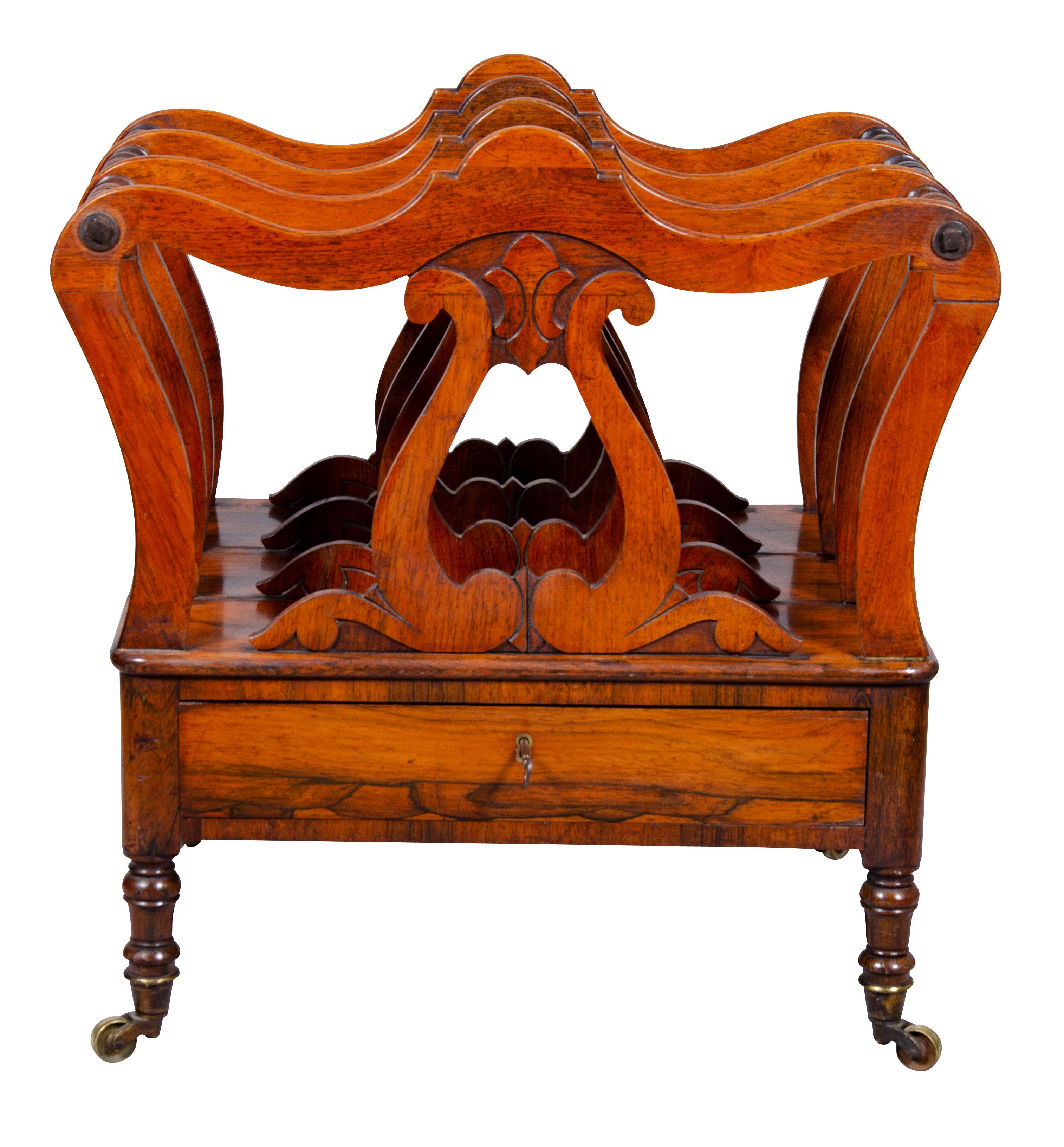 Very finely made likely by Gillow. Using finely figured rosewood. The drawer finely constructed including a key. Unusual form transitioning from the classical Regency to Victorian.