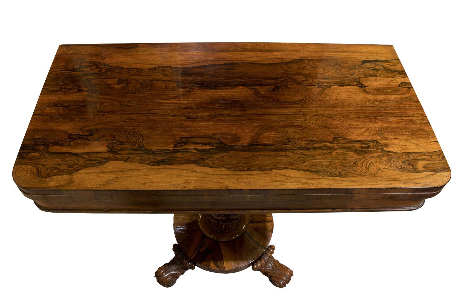 Hand-Carved William IV Rosewood card table standing on a central pedestal and carved base For Sale
