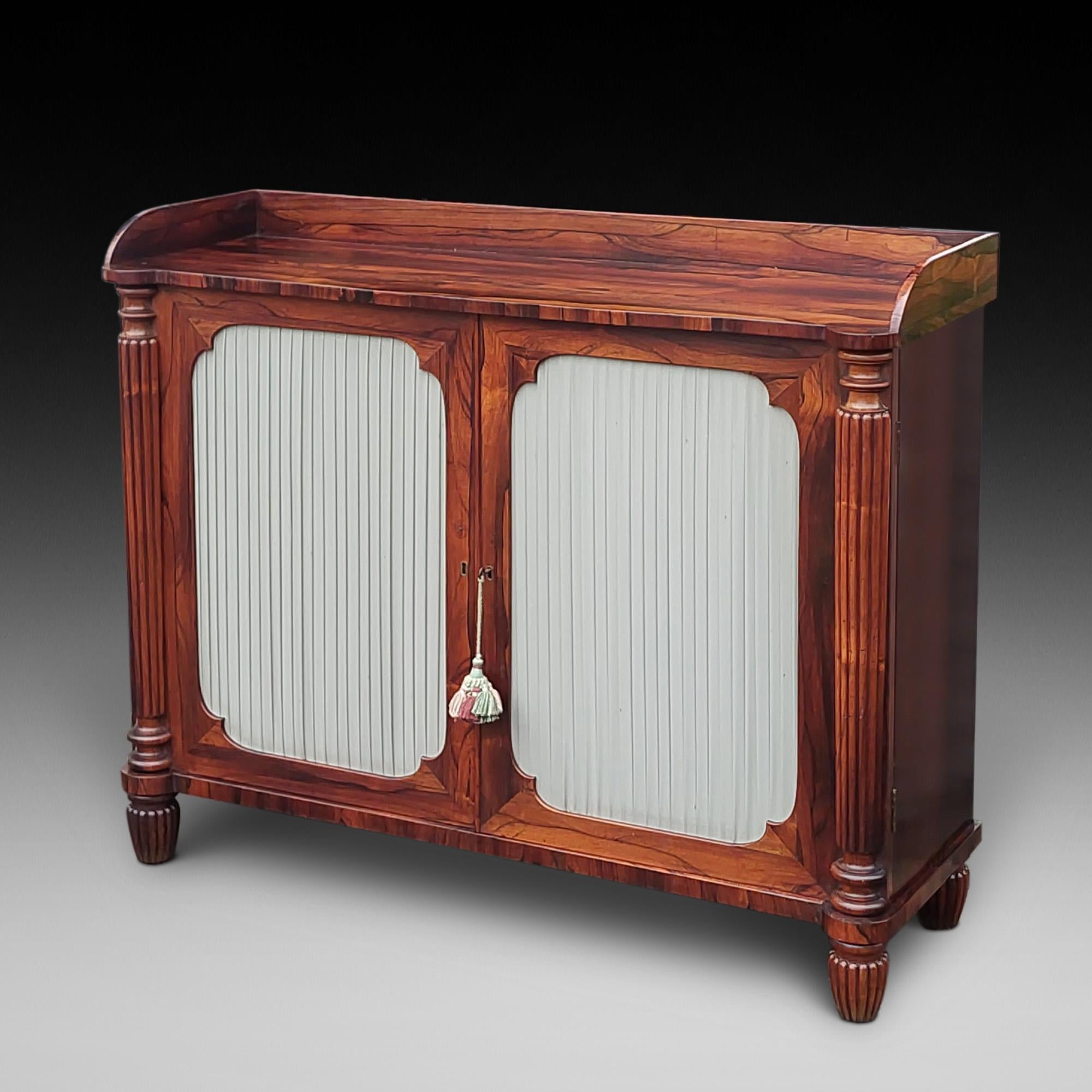 William IV Rosewood Chiffonier Side Cabinet - with Galleried Top over Panelled Doors covered with Pleated Fabric flanked by Reeded Columns on Bun Feet - 48.5