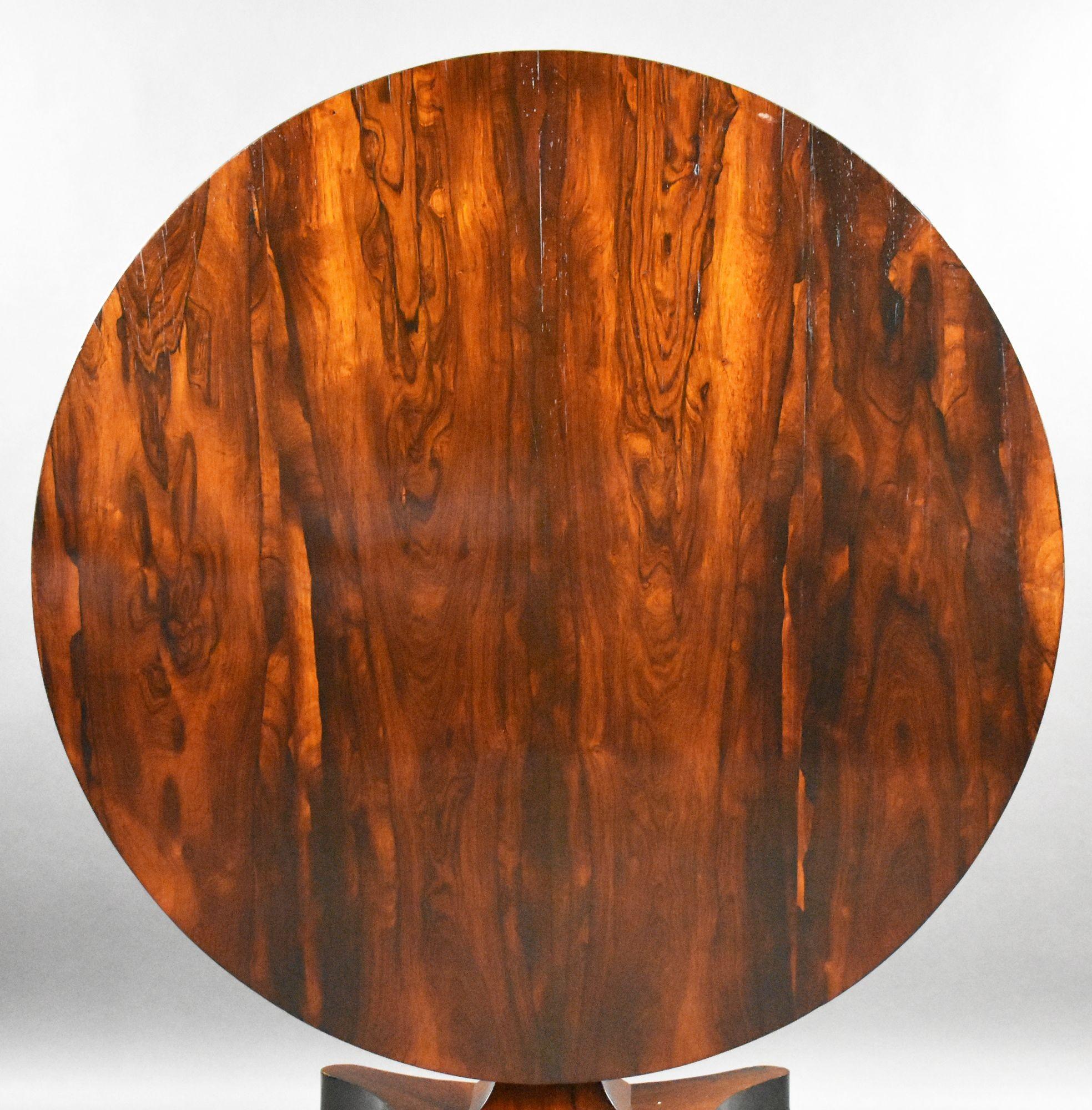 William IV Rosewood Circular Breakfast Table
Item Code: 1362
An elegant William IV period circular breakfast table, superbly constructed from beautifully figured rosewood. The tilting top displays a striking, richly grained surface, resting upon a
