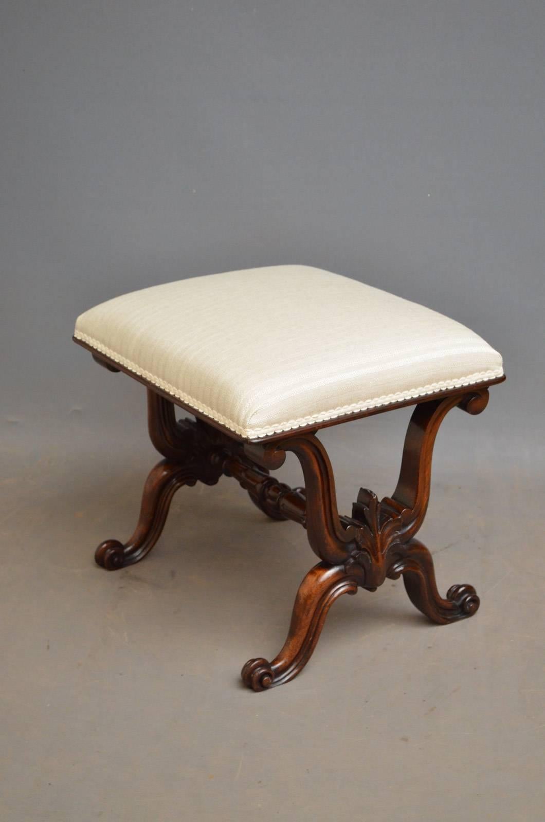 Sn4363, fine quality William IV, rosewood, X-frame stool with newly upholstered seat with contemporary cover and finely carved scroll legs united by turned and lotus carved stretcher. This antique stool retains its original color, finish and patina,