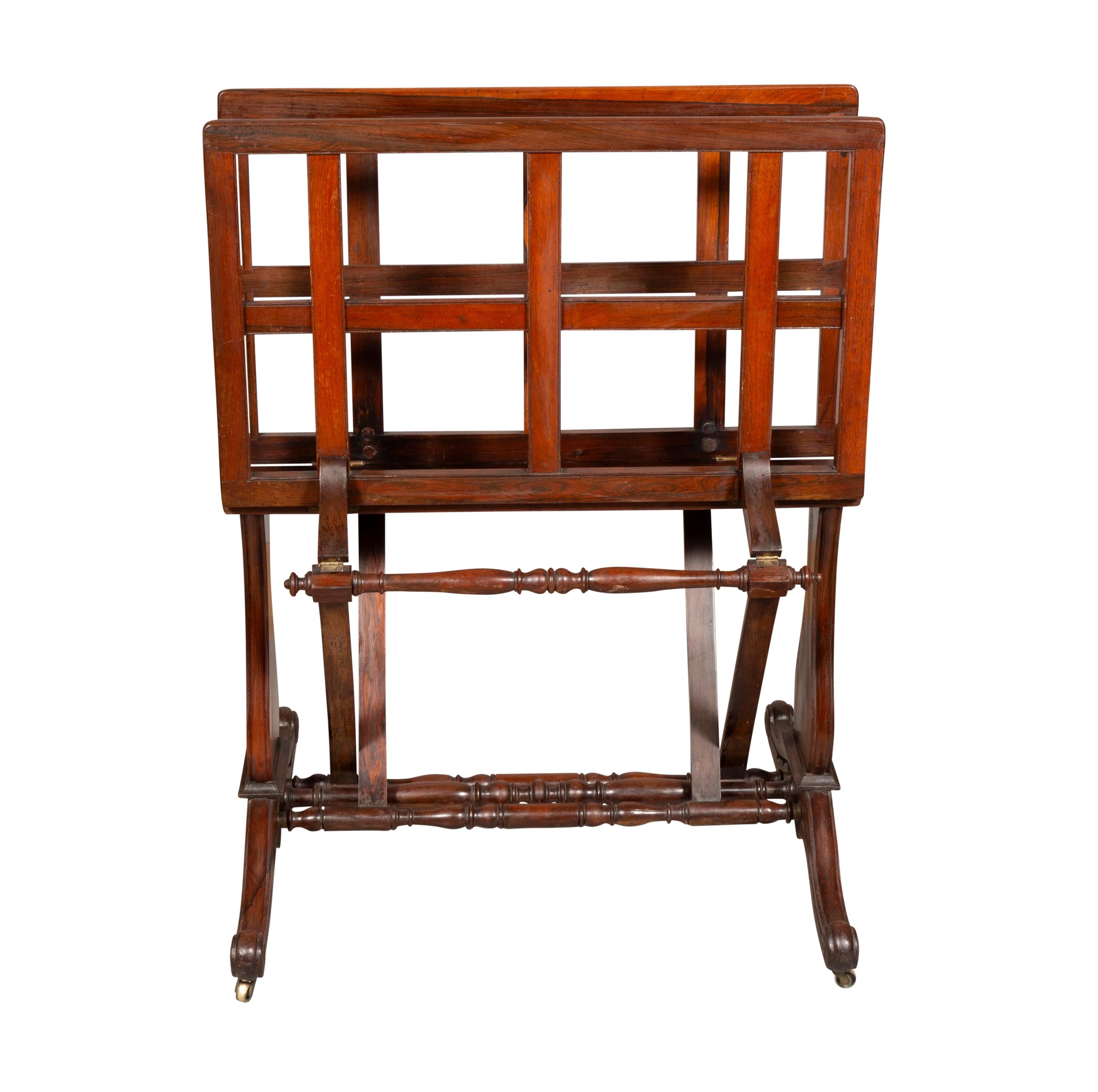 The angle of the rack is adjustable with your foot lifting up on the bottom rail. Constructed of solid rosewood. Handy for prints, paintings or poster collections. Also for artists displaying their works.