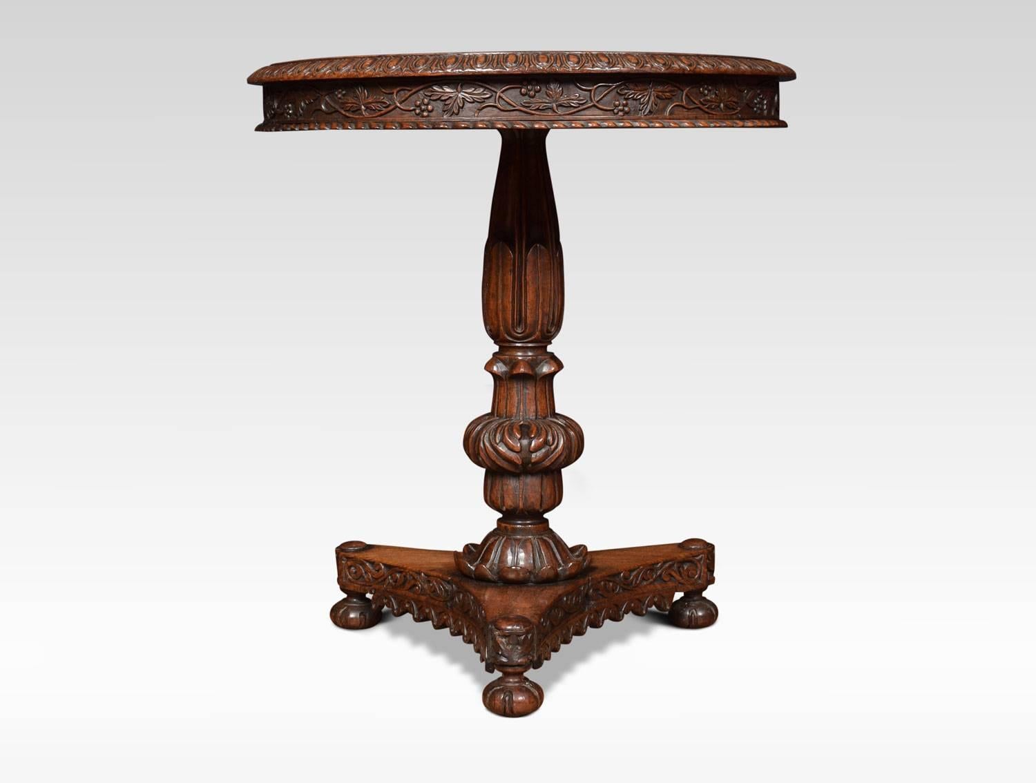 19th century rosewood lamp table, the circular top with egg and dart moulded edge above carved freeze. Raised up on carved central column and platform base. Terminating in bun feet.
Dimensions
Height 26.5 inches
Width 23.5 inches
Depth 23.5