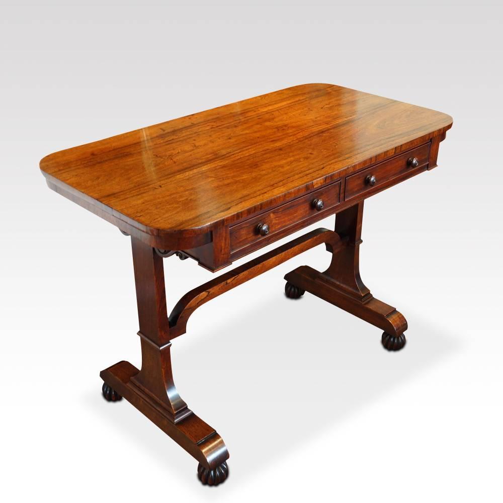 William IV rosewood small library table
This William IV rosewood small library table was first made, circa 1830.
The library table stands on end supports, that run down to a platform base with lovely segmented turned feet and concealed castors