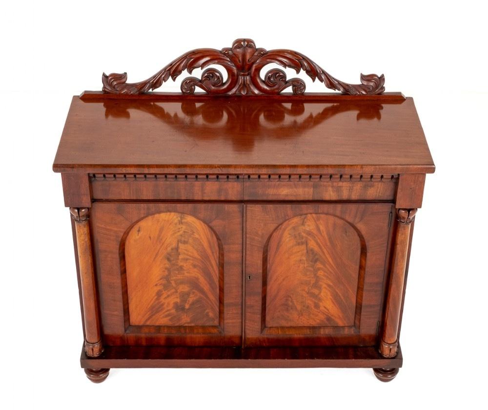 William IV Mahogany 2 Door Side Cabinet.
This Quality Cabinet Stands Upon Turned Feet.
Circa 1860
The 2 Doors Featuring Wonderful Flame Mahogany Timbers and are Flanked by Typical William IV Turned and Carved Columns.
The Cabinet Features 1 Drawer