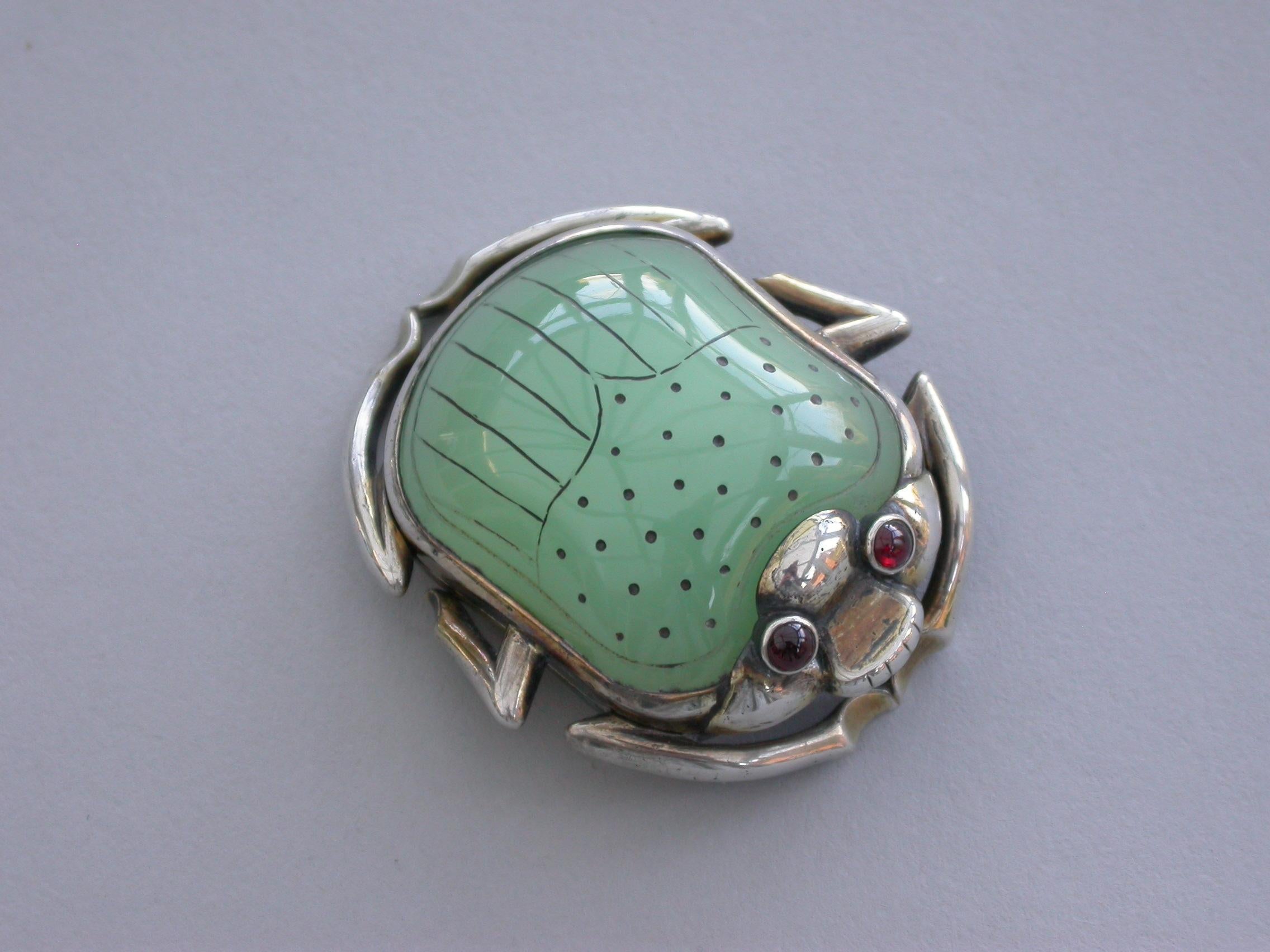 An extremely fine quality William IV silver gilt Vinaigrette formed as a Scarab Beetle, the lid inset with a polished and decorated Chrysoprase, red cabochon eyes, mandibular detail and separated legs to the side, the base contoured and with front