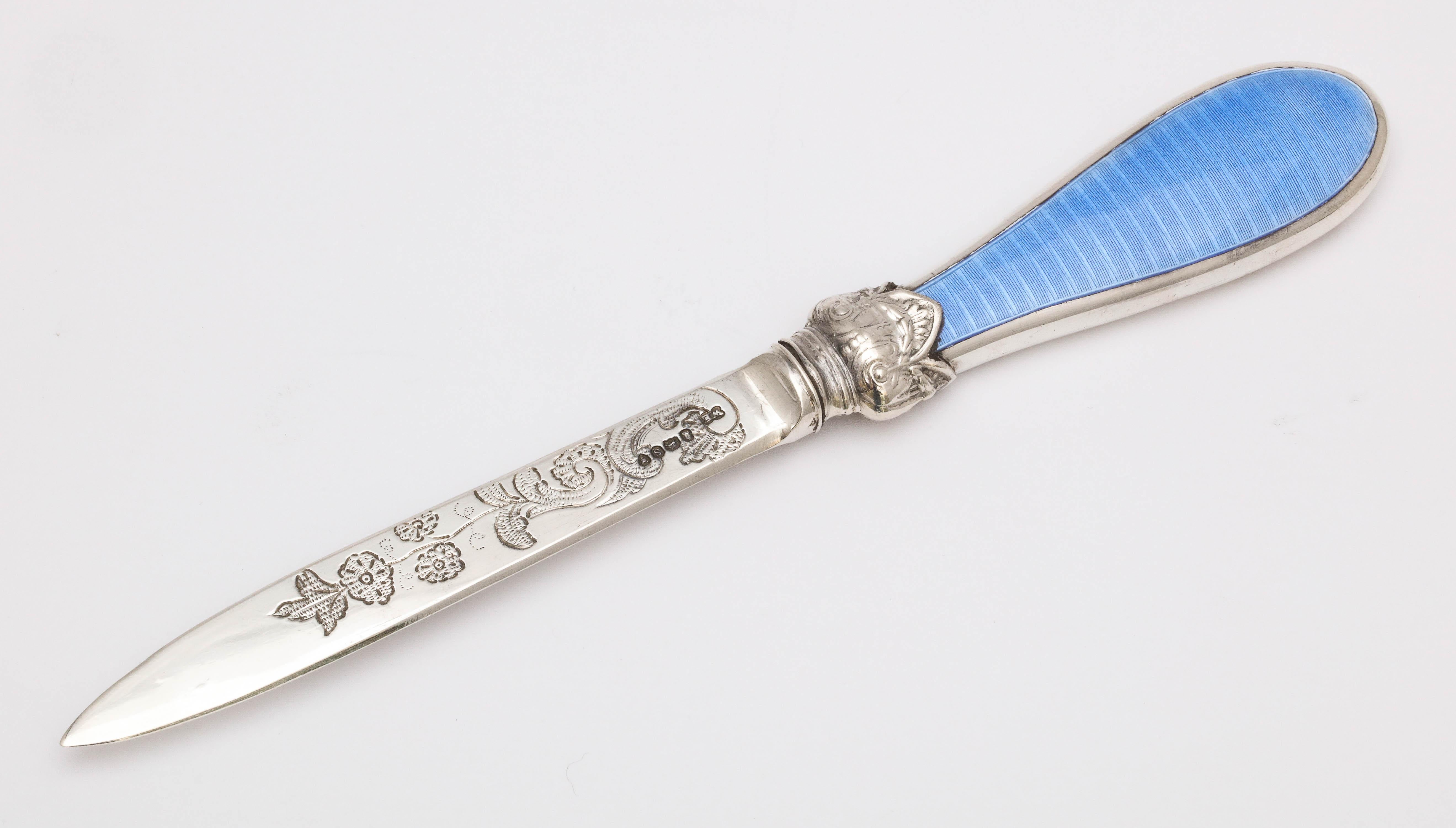 William IV, sterling silver and blue guilloche enamel letter opener/paper knife, London, year hallmarked for 1833, William Eaton - maker. Sterling silver blade is etched with flowers, leaves and swirls. Blue guilloche enamel is on one side of the