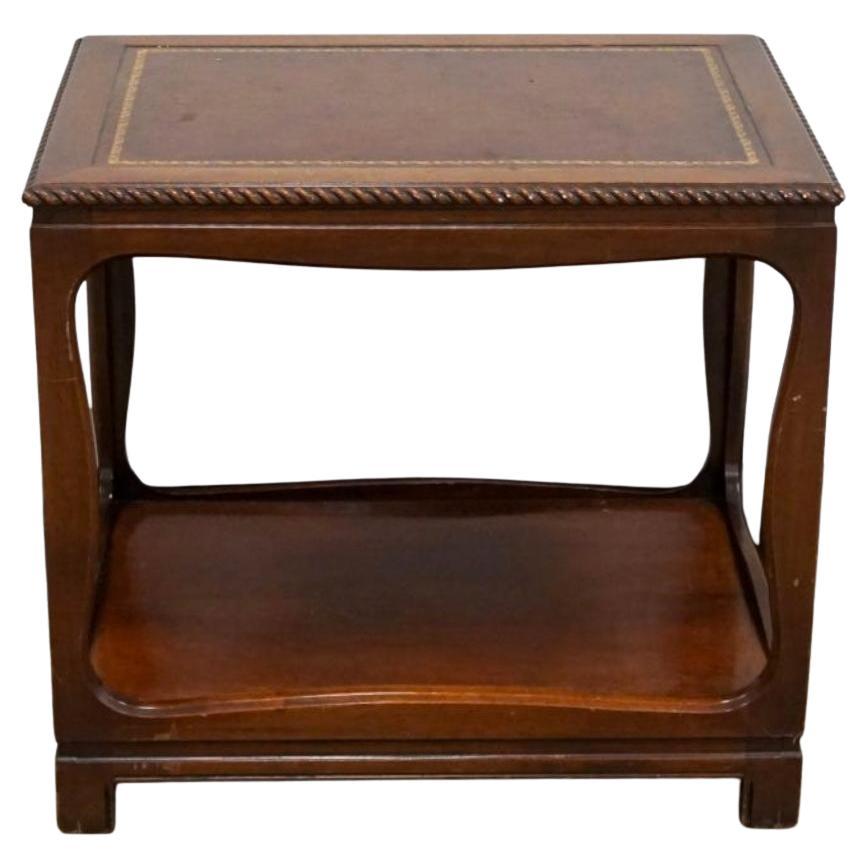 A William IV Style Mahogany and Tooled Leather Inset Top Side Table.
Measures: 26.5