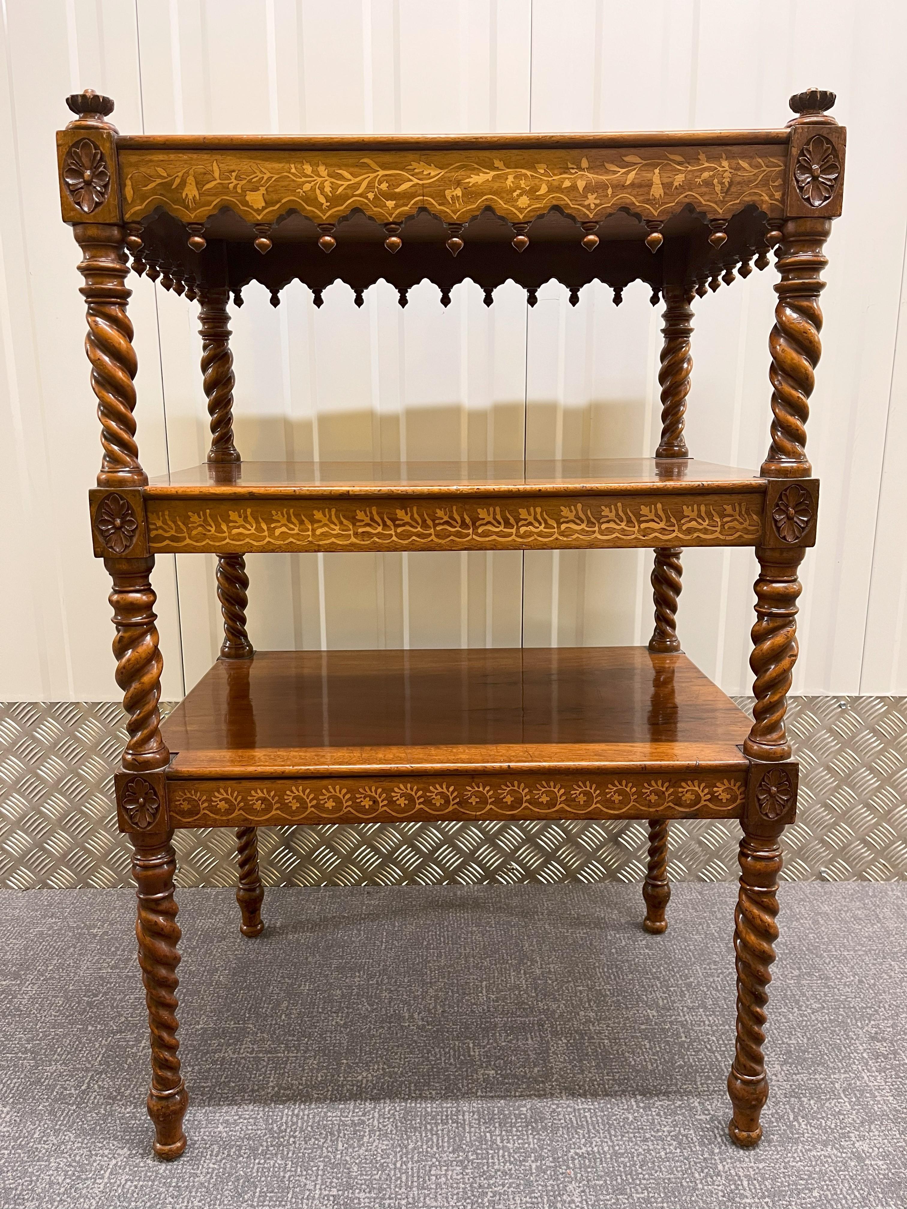 An attractive antique 3 tier Whatnot, English polished Walnut with inlaid side decorations and turned baluster's, early 19th century.    