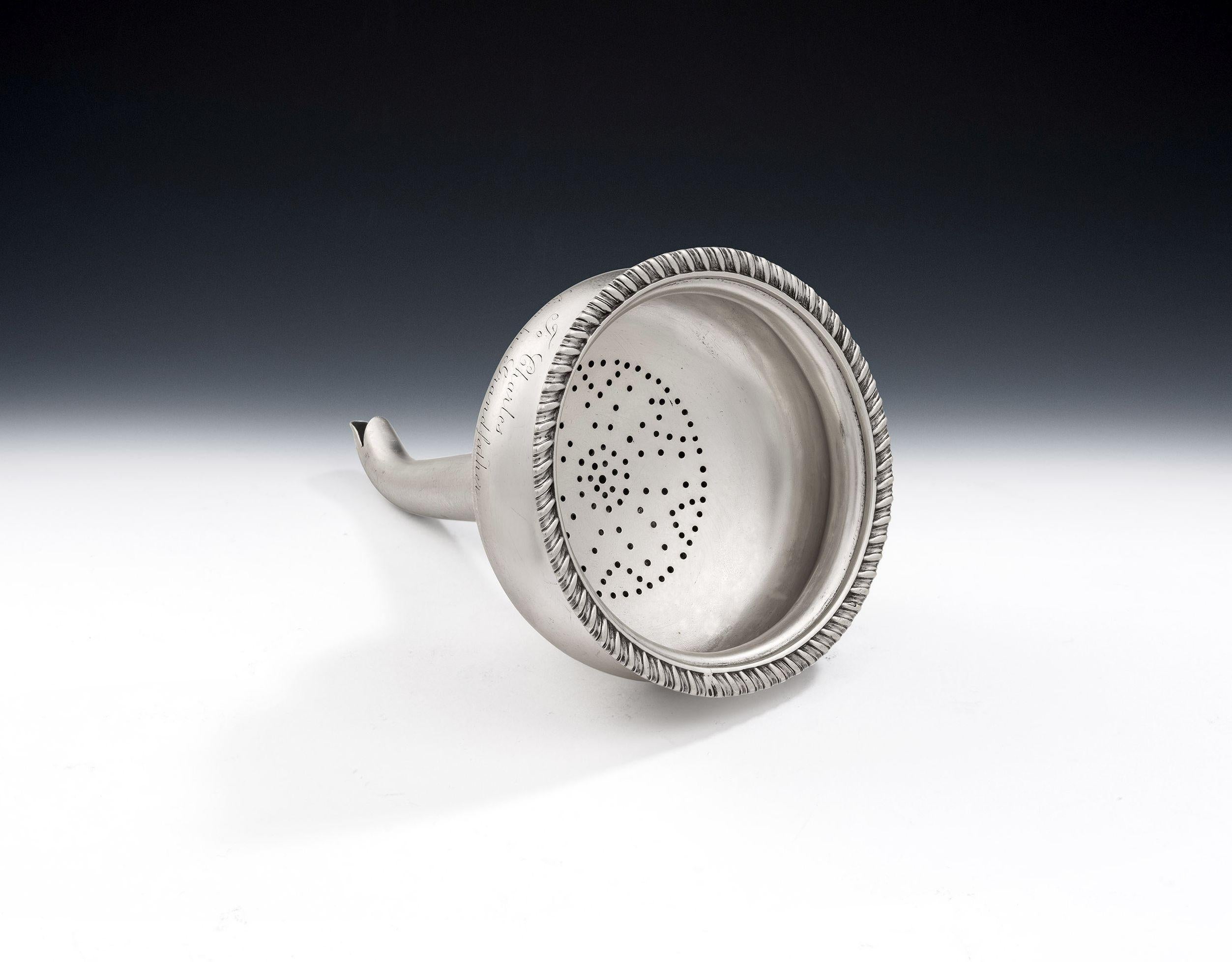Exeter. A Very Rare William IV Wine Funnel Made in Exeter in 1833 by Isaac Parkin.

The Wine Funnel is of typical form and the bowl is baluster in shape, with a gadrooned rim and side clip so that it can be attached to the side of a punch bowl, if