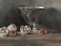 Nature morte peinte à l'huile avec un bol en bois, des baies et des noix à la lumière naturelle