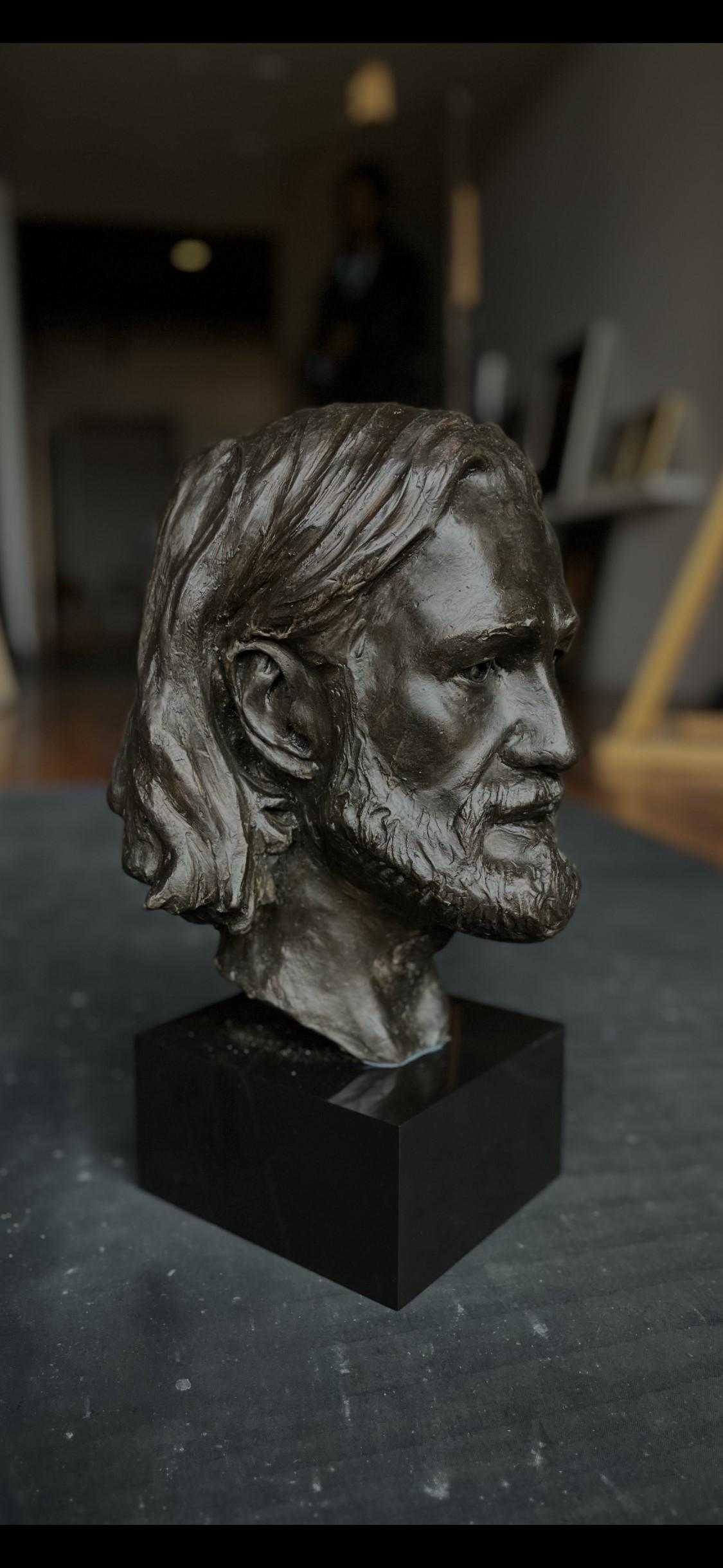 Scultura di testa maschile in bronzo 